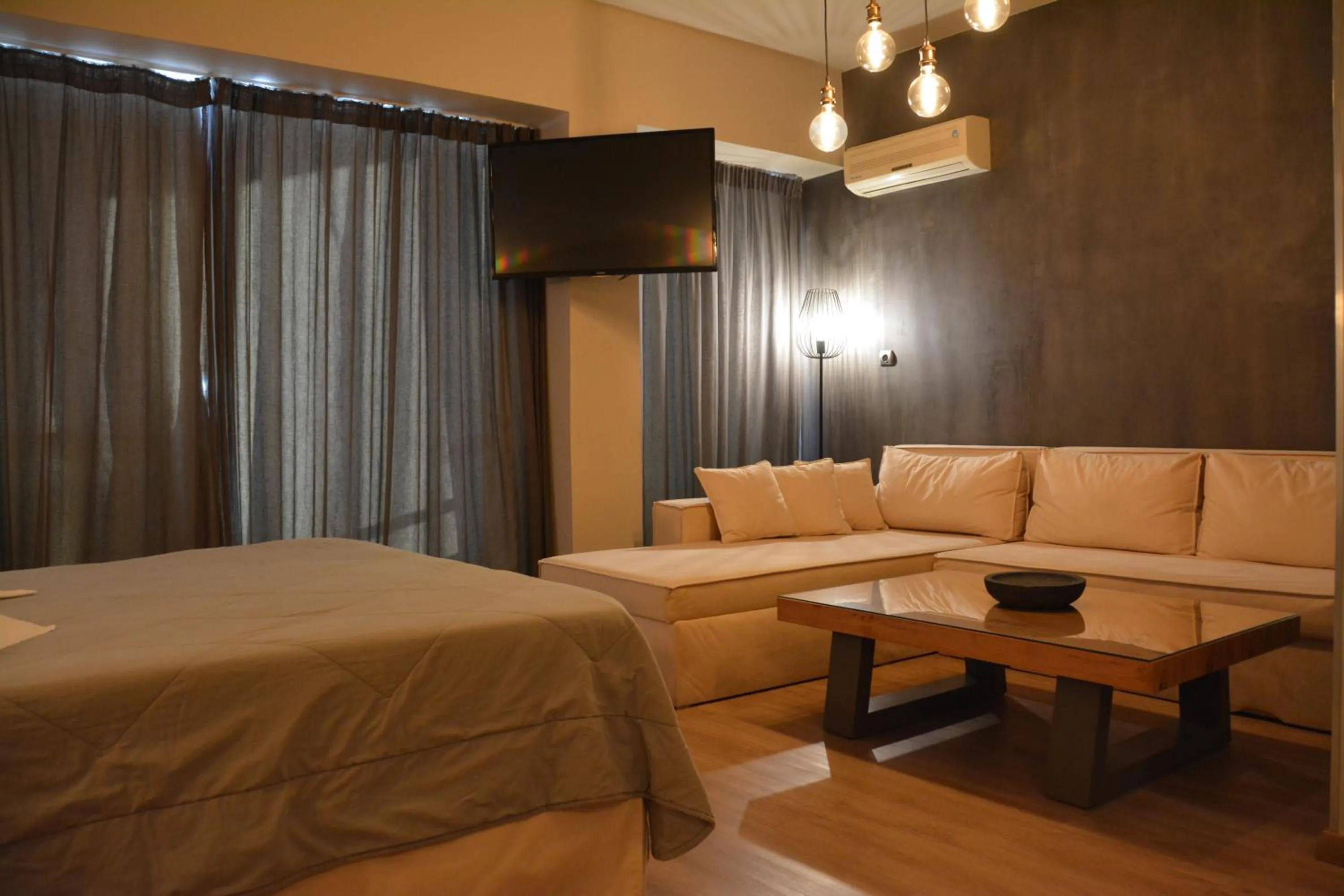 Bed in Scorpios Sea Side Hotel