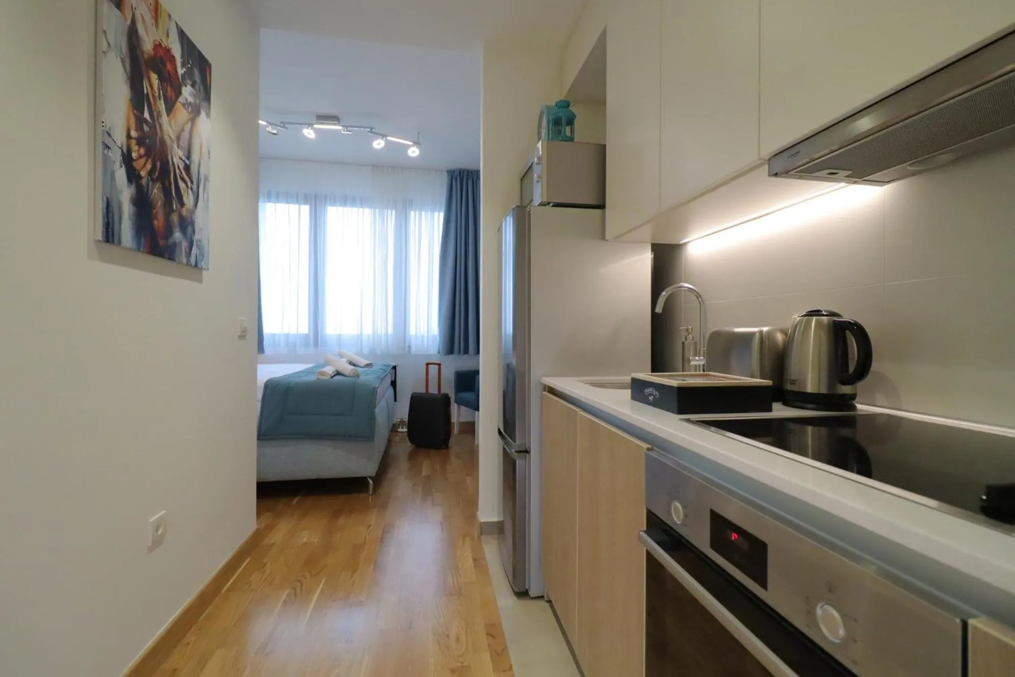 Kitchen or kitchenette, Bed in Apartments Royal - Belgrade Waterfront