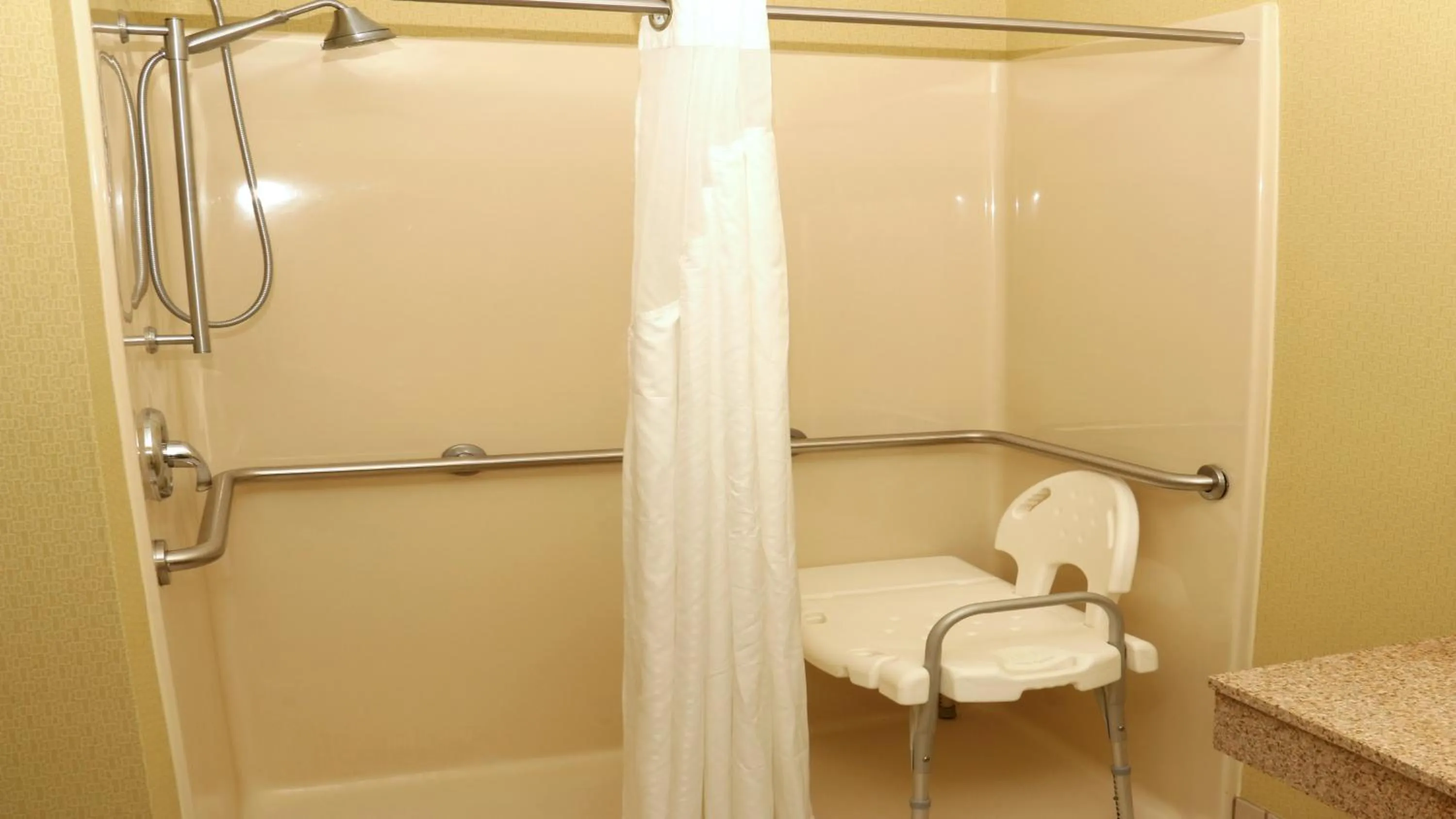 Shower in Holiday Inn Express Hotel & Suites Saginaw by IHG
