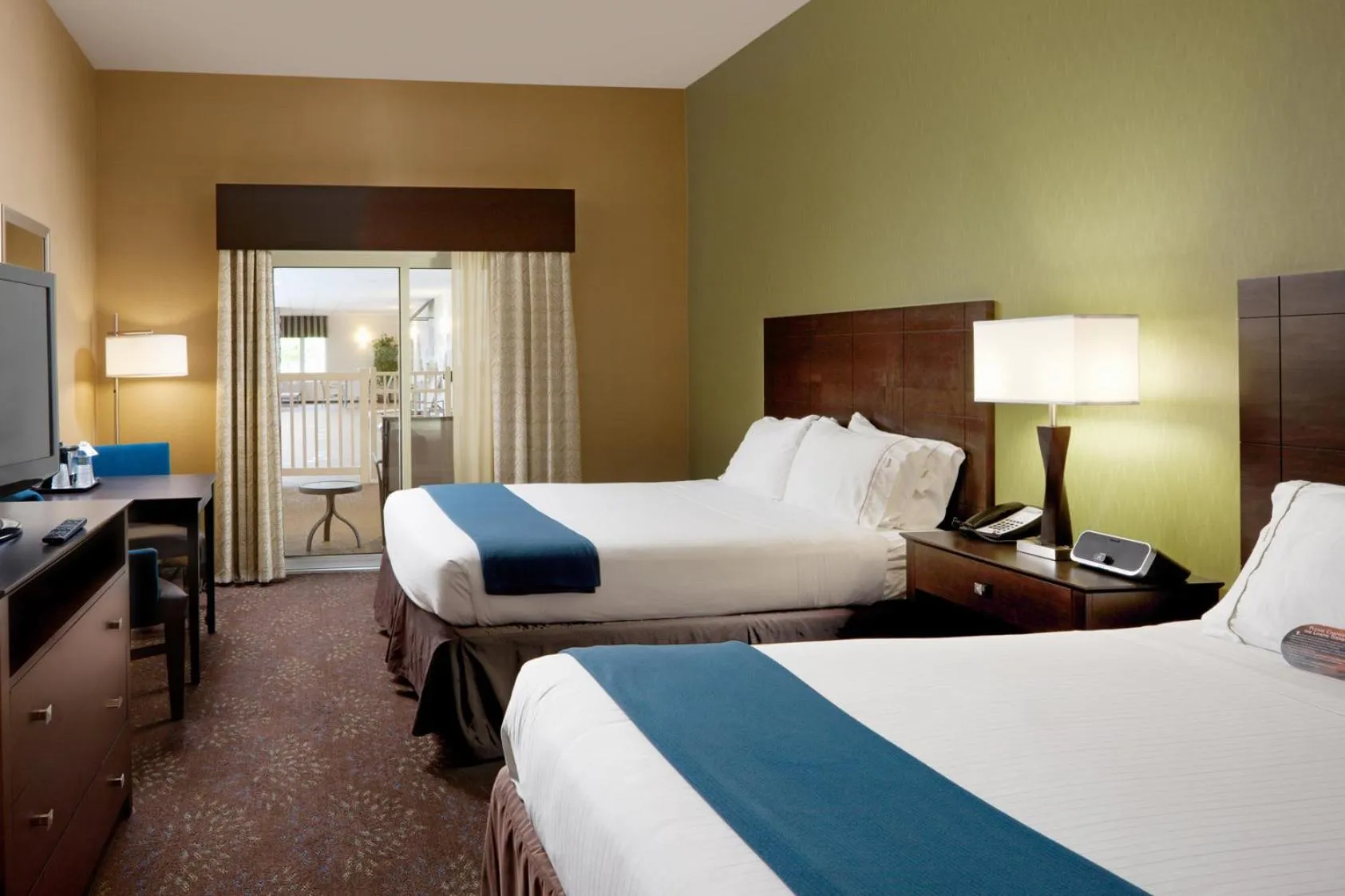 Pool view, Bed in Holiday Inn Express Hotel & Suites Saginaw by IHG
