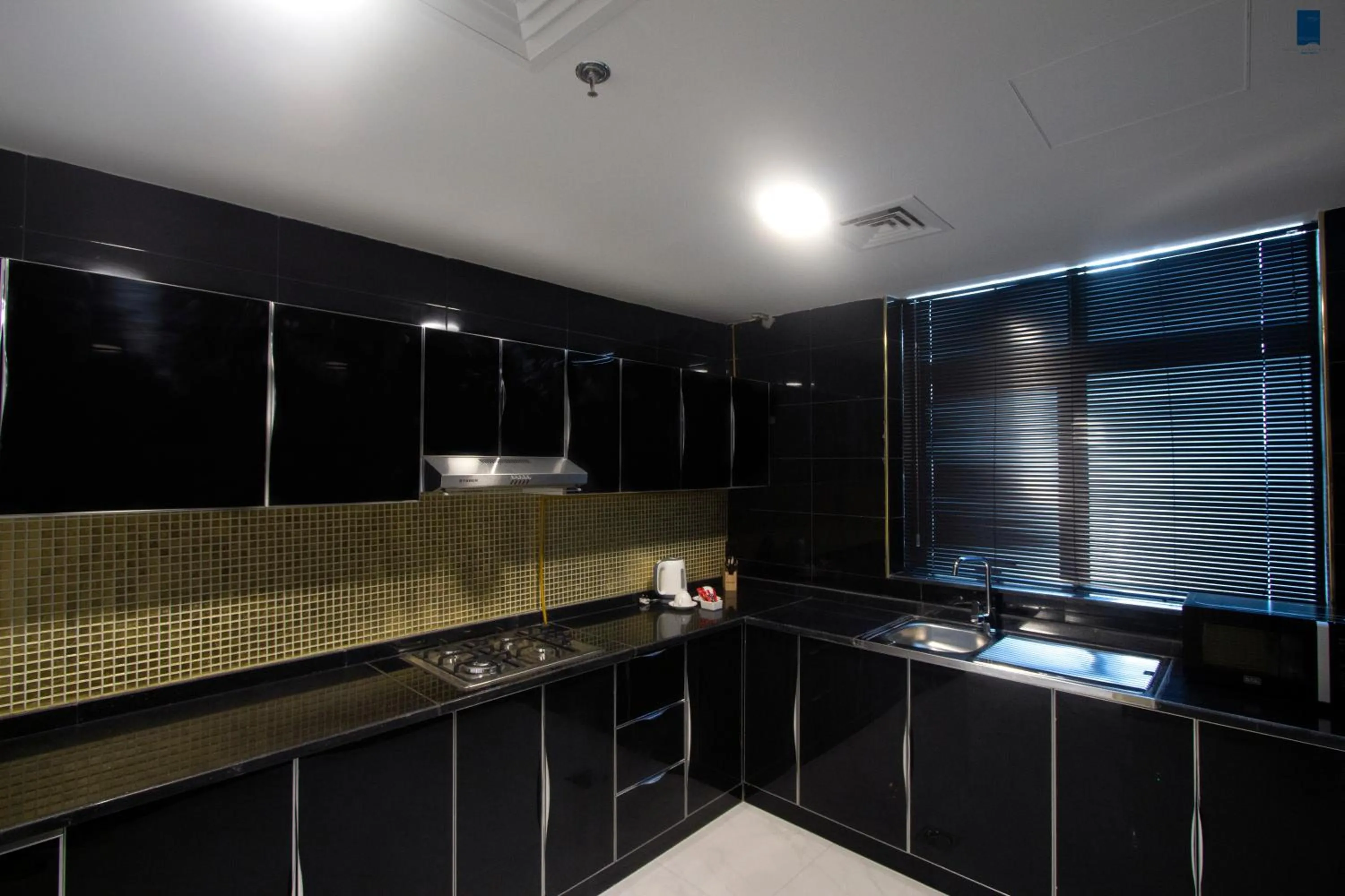 Kitchen or kitchenette in Samaya Hotel Apartment Dubai