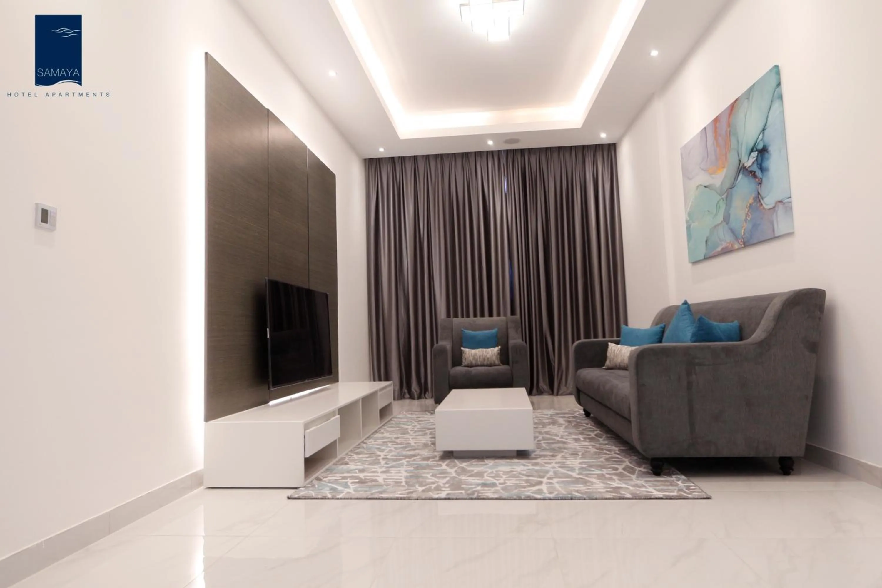 Communal lounge/ TV room in Samaya Hotel Apartment Dubai