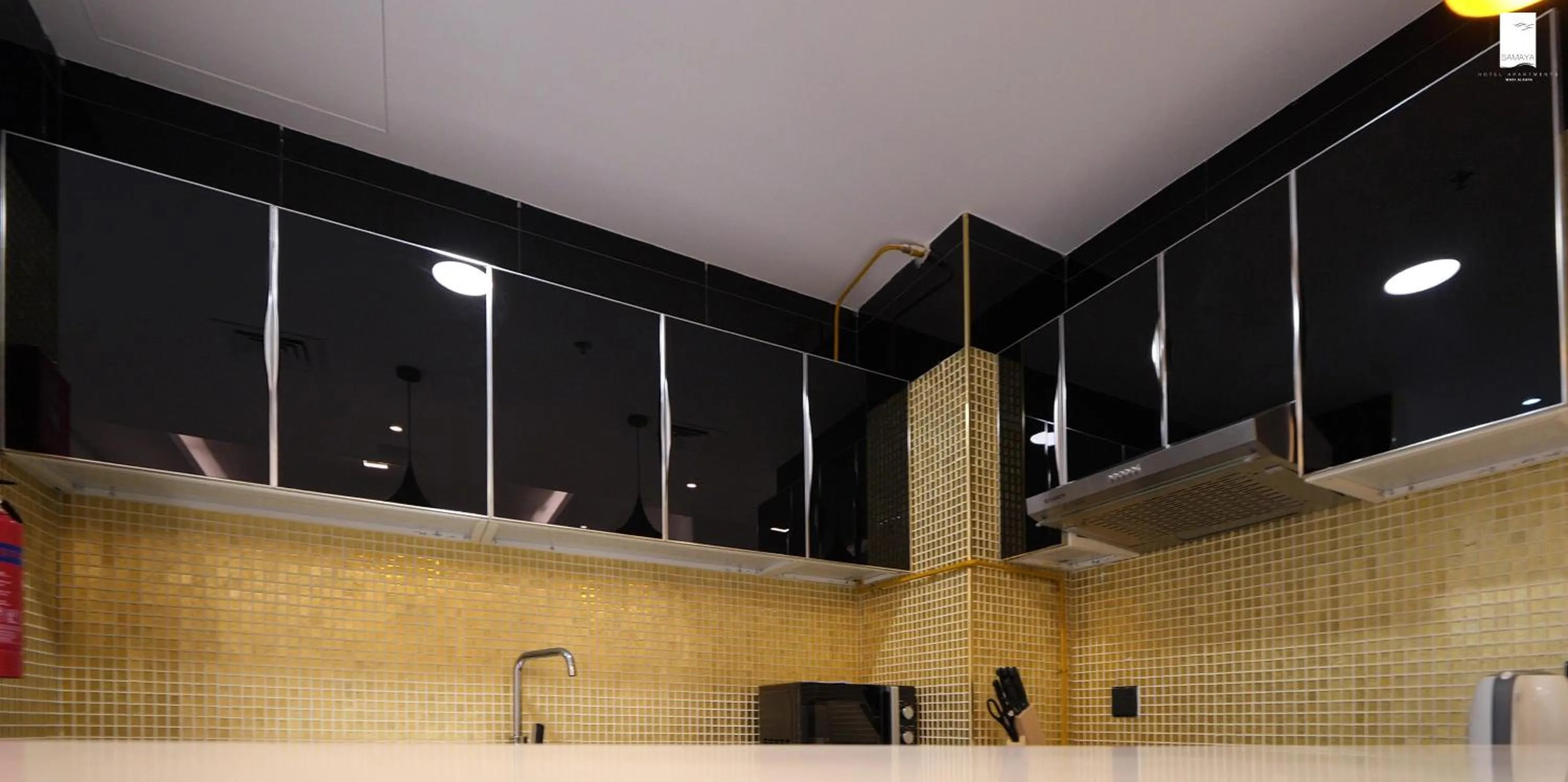 Kitchen or kitchenette in Samaya Hotel Apartment Dubai
