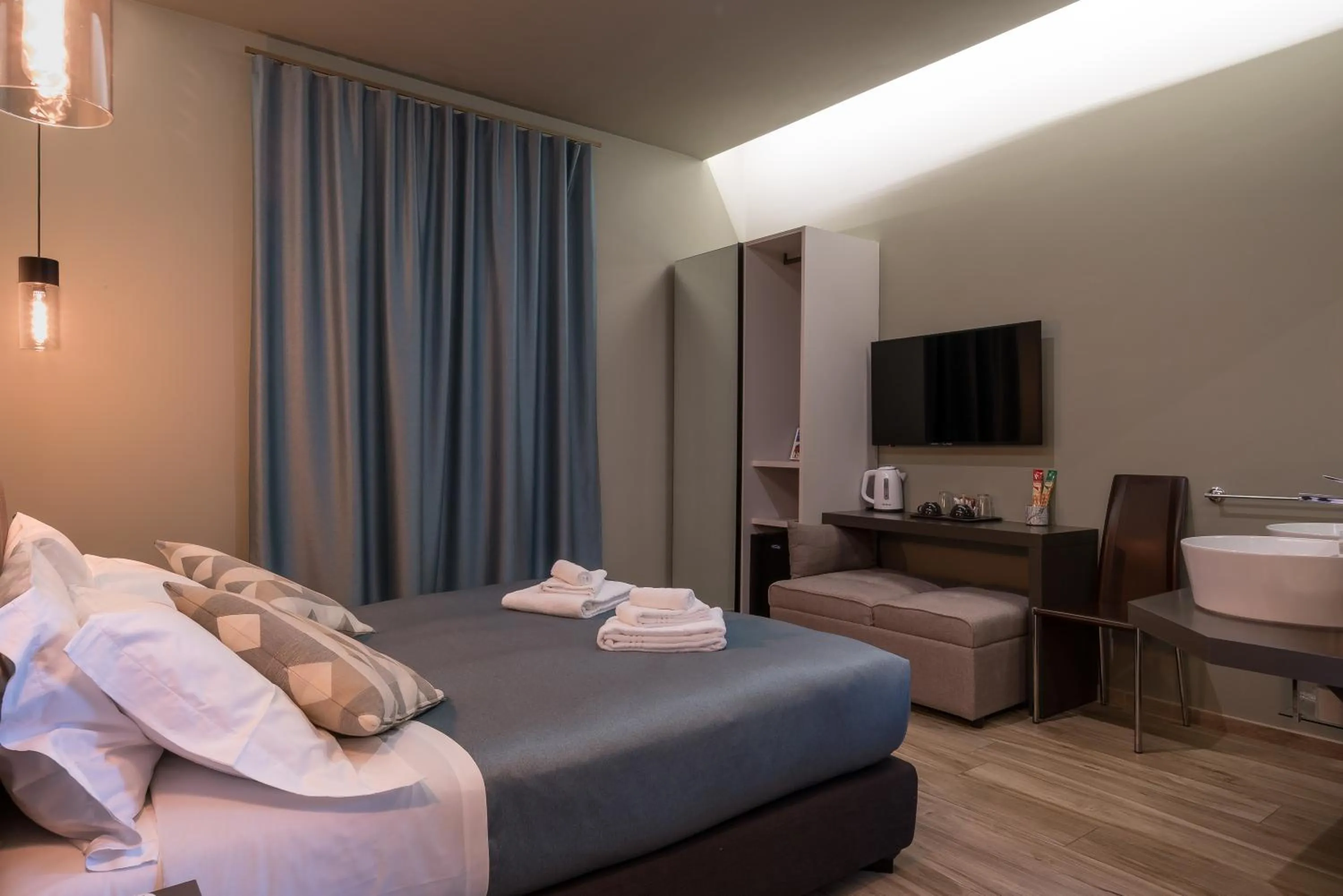 Bed in GOGO` Petit Hotel