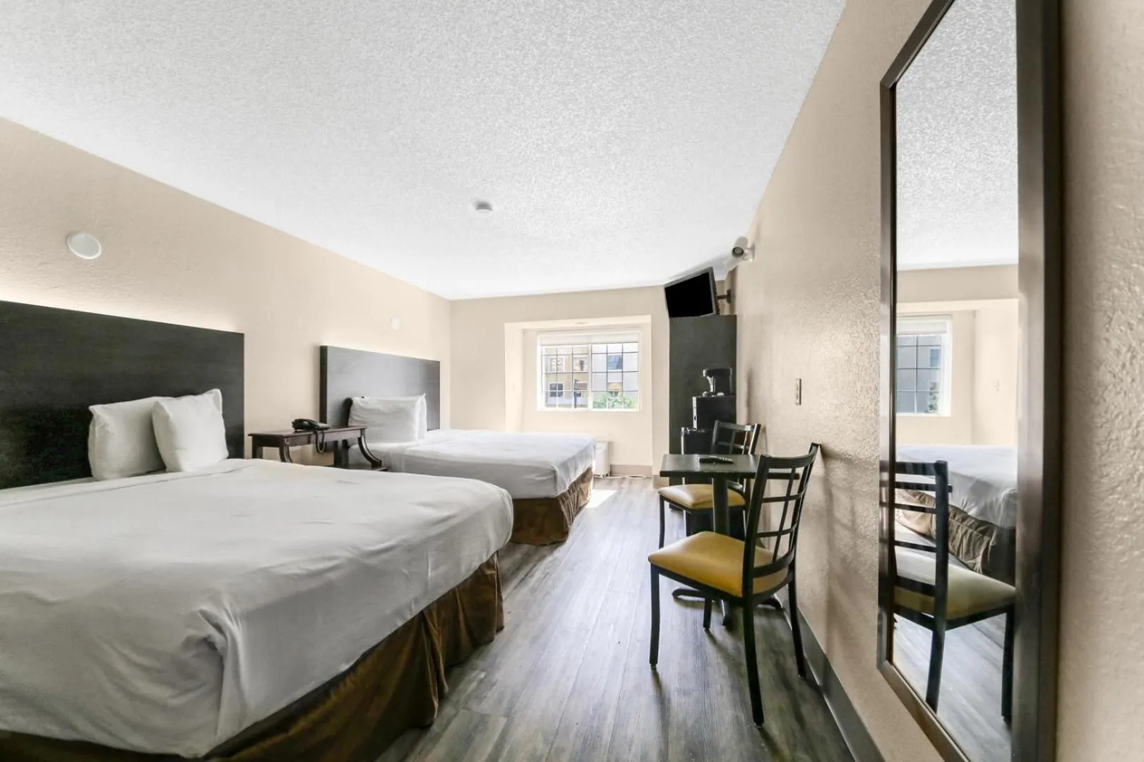 Photo of the whole room, Bed in Baymont by Wyndham Orlando-International Dr-Universal Blvd