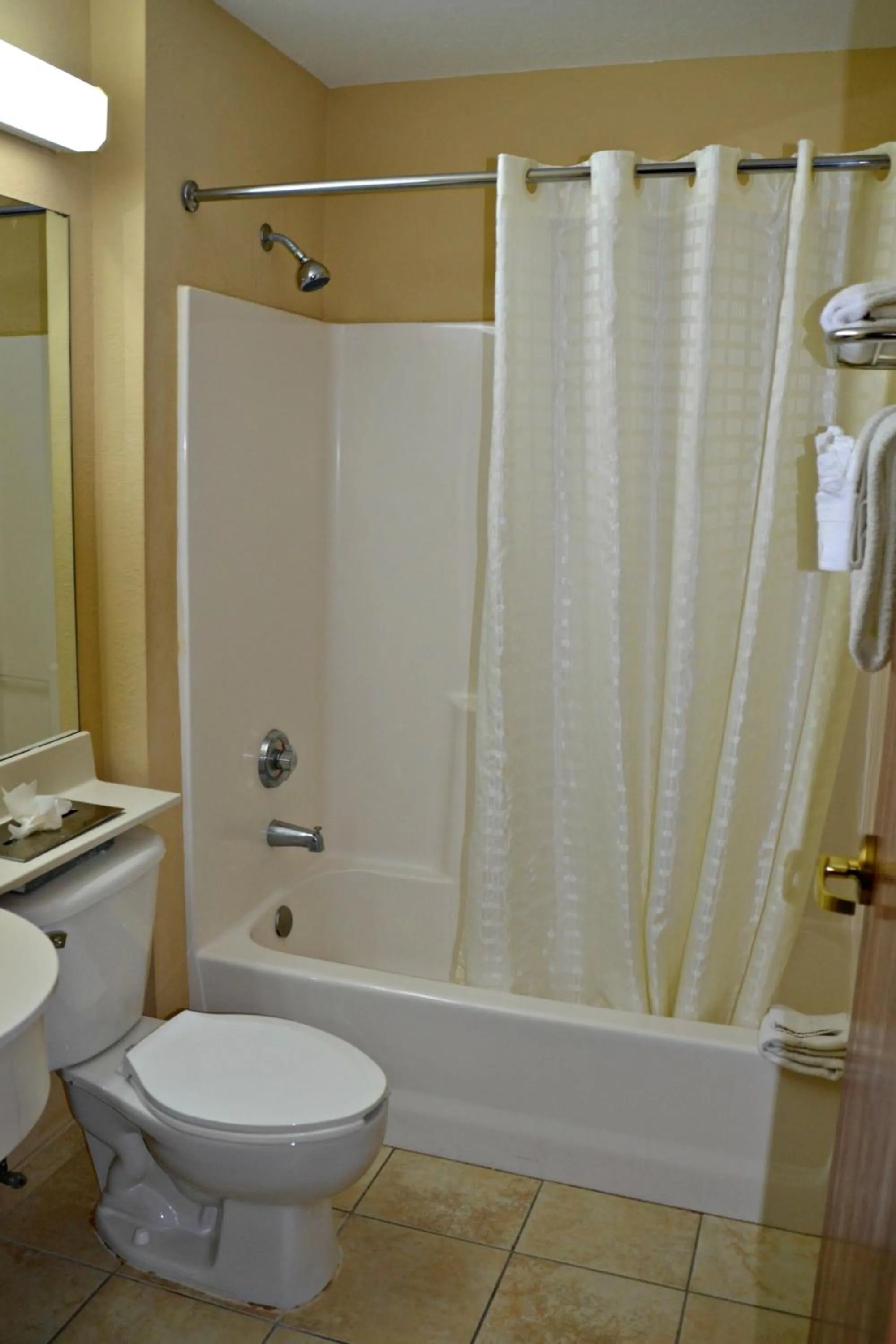 Bathroom in Baymont by Wyndham Orlando-International Dr-Universal Blvd