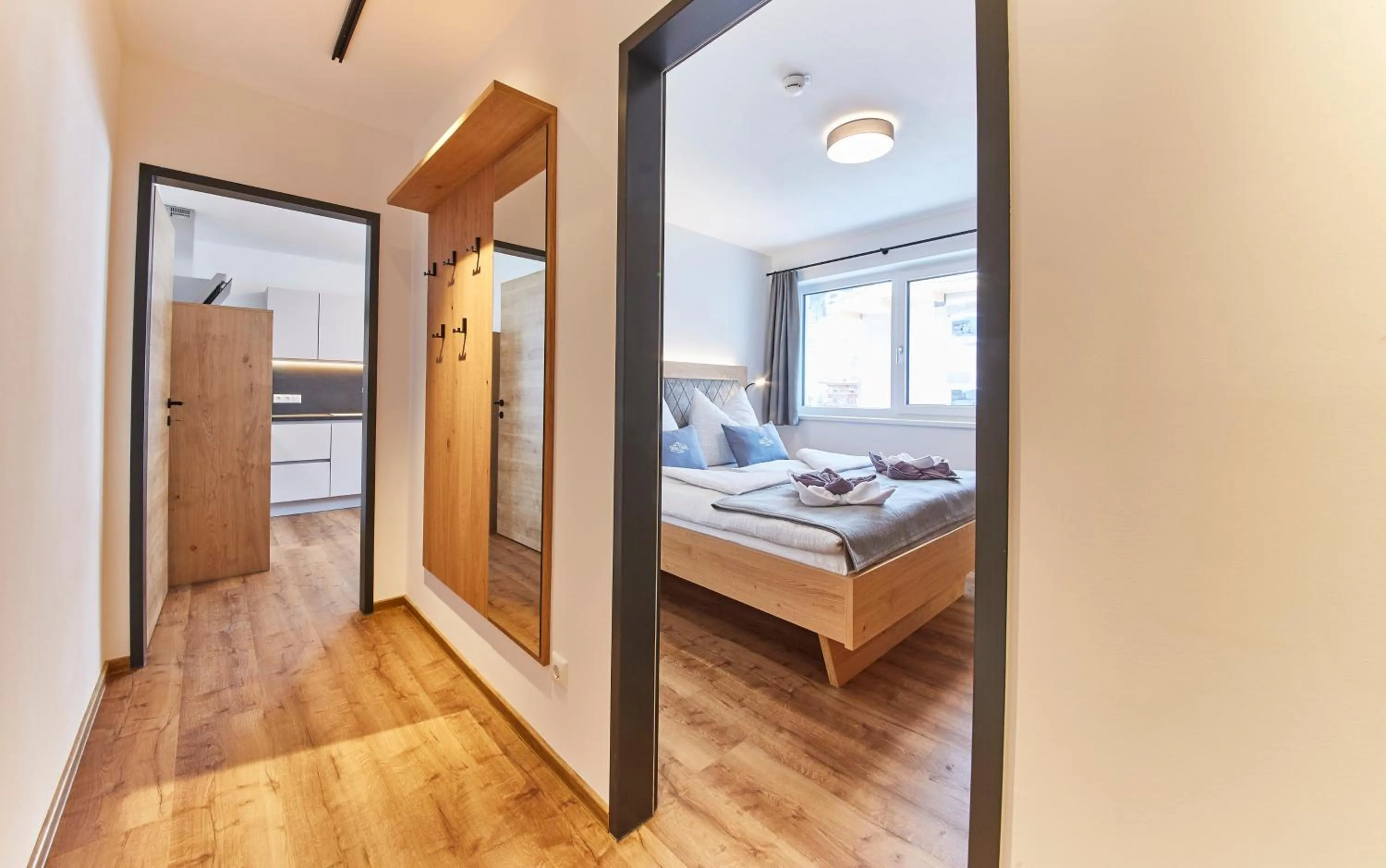 Communal lounge/ TV room, Bed in Wiesl Lodge Saalbach