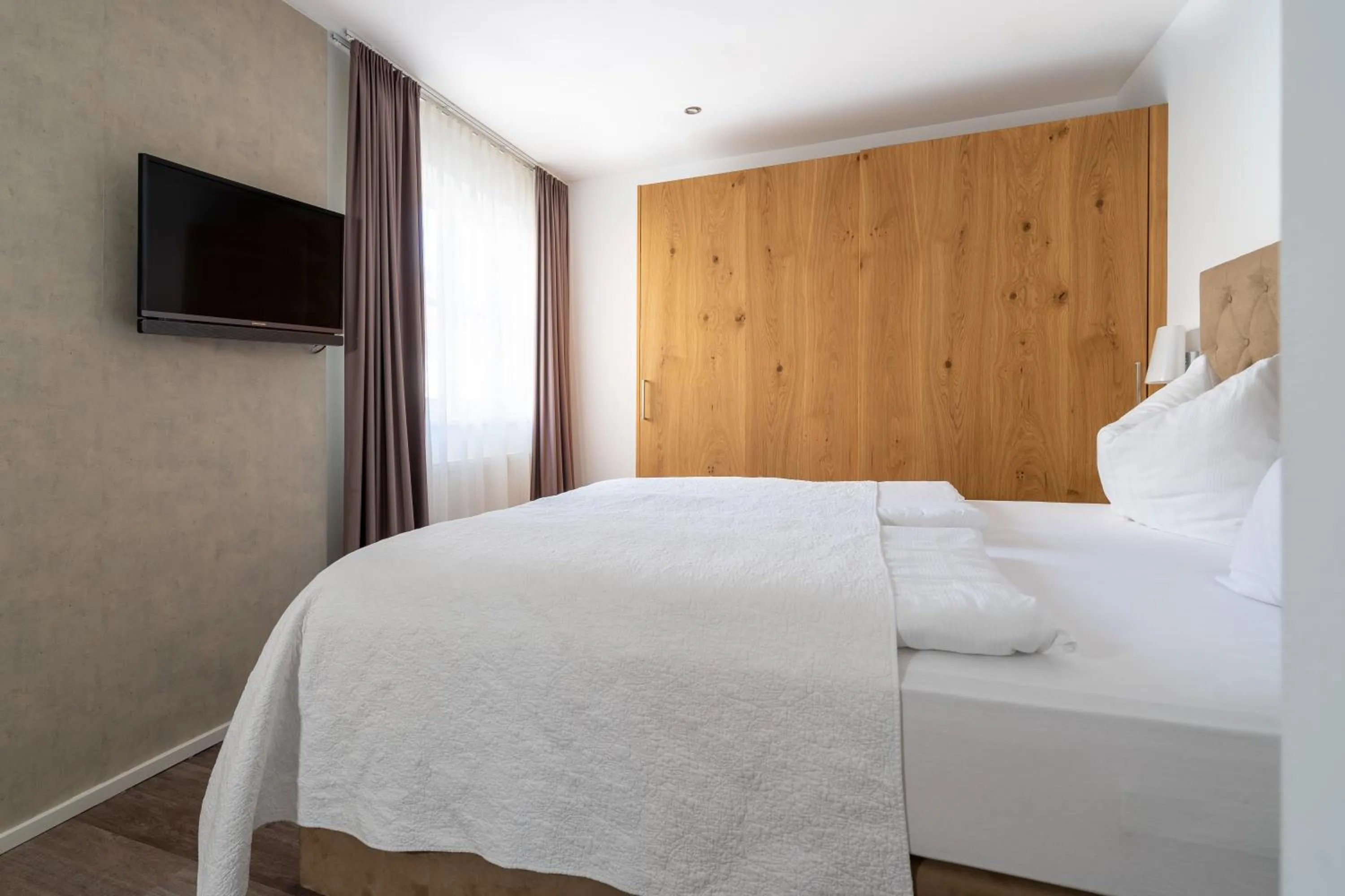 Bed in Kaiser Max Design Appartements