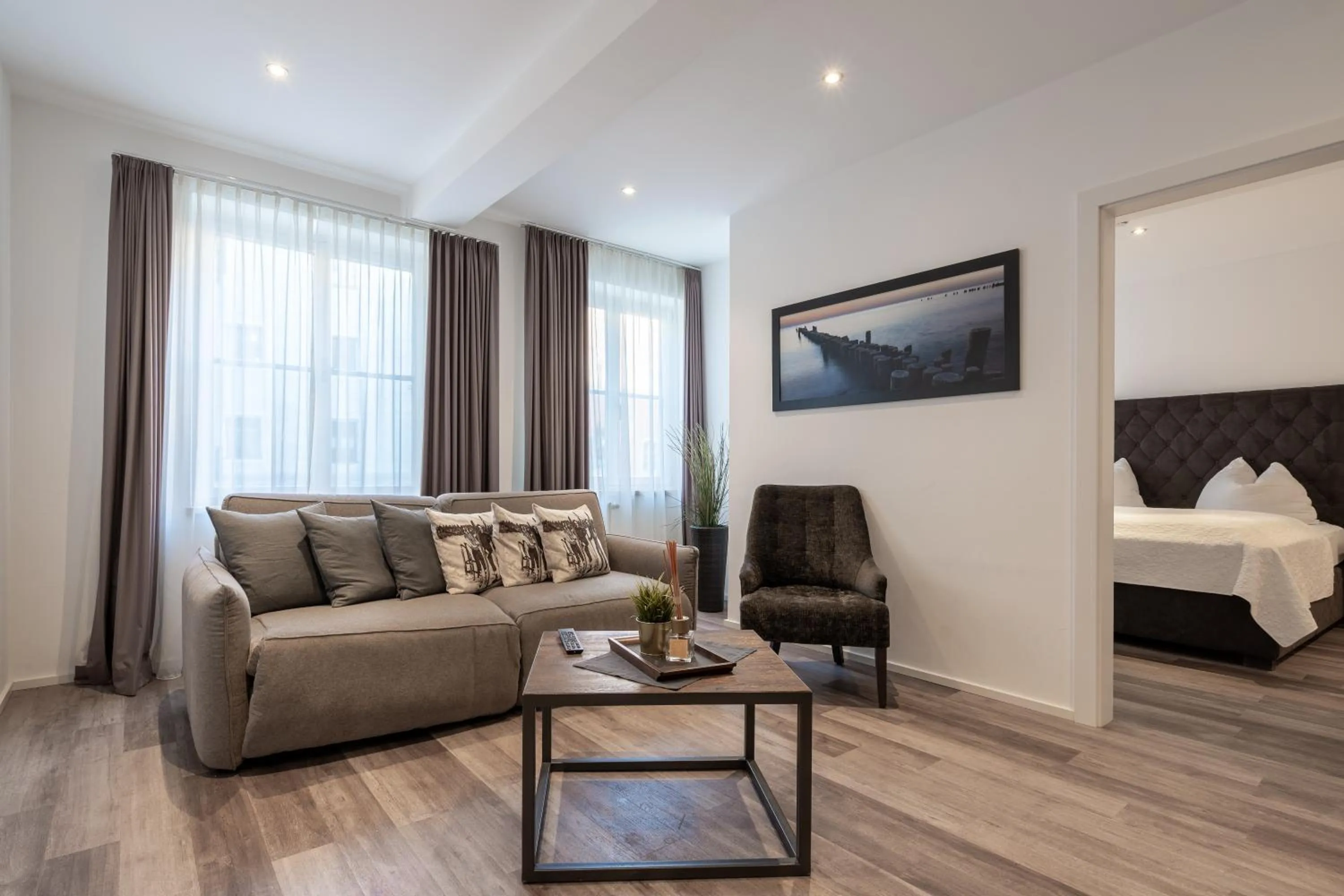 Living room, Bed in Kaiser Max Design Appartements