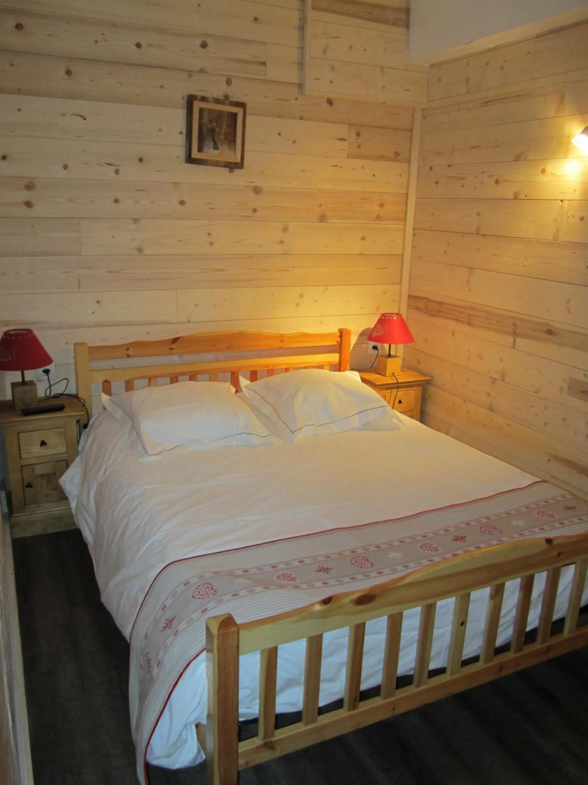 Bed in Hôtel Chalet Le Caribou