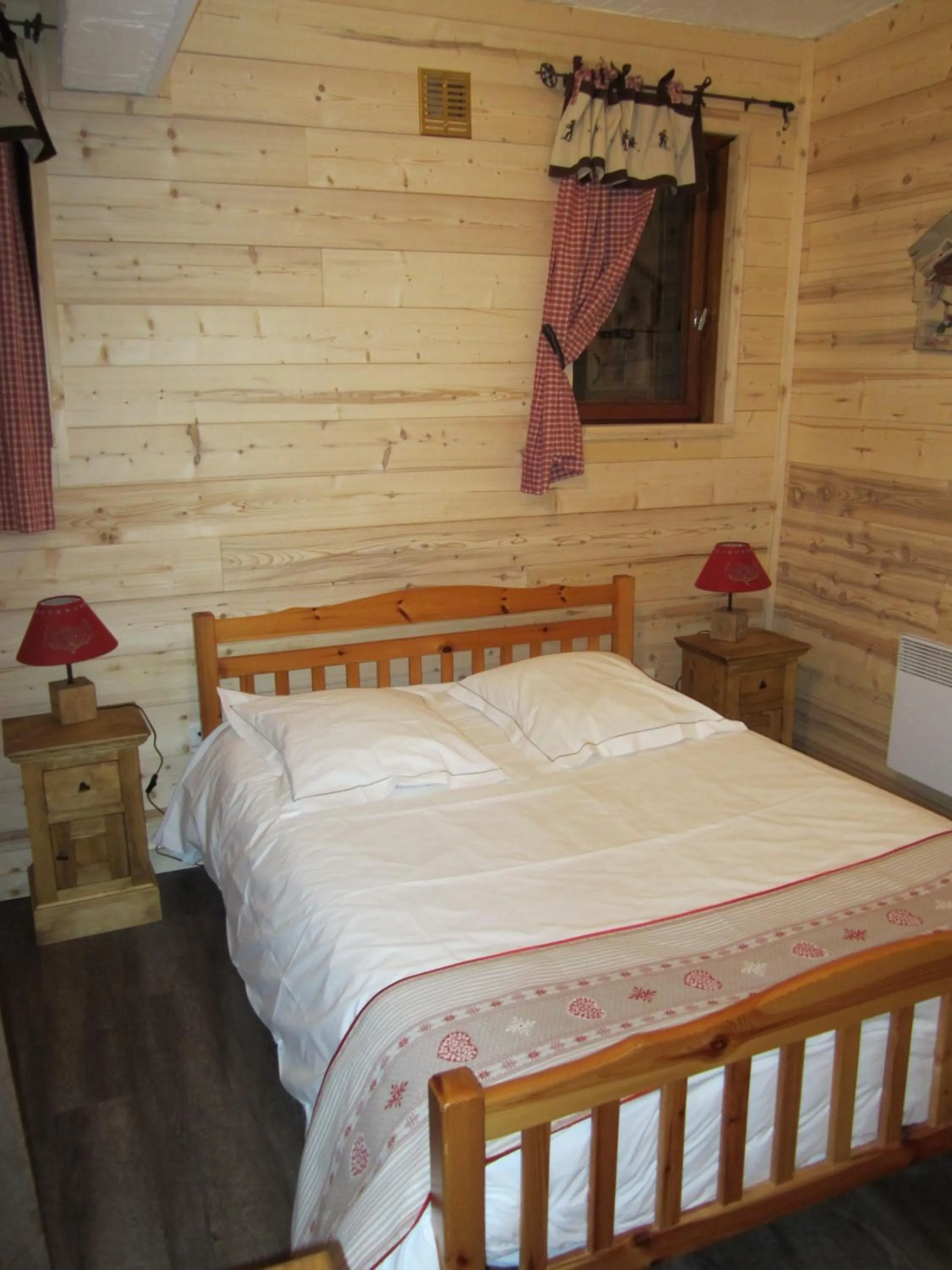 Bed in Hôtel Chalet Le Caribou