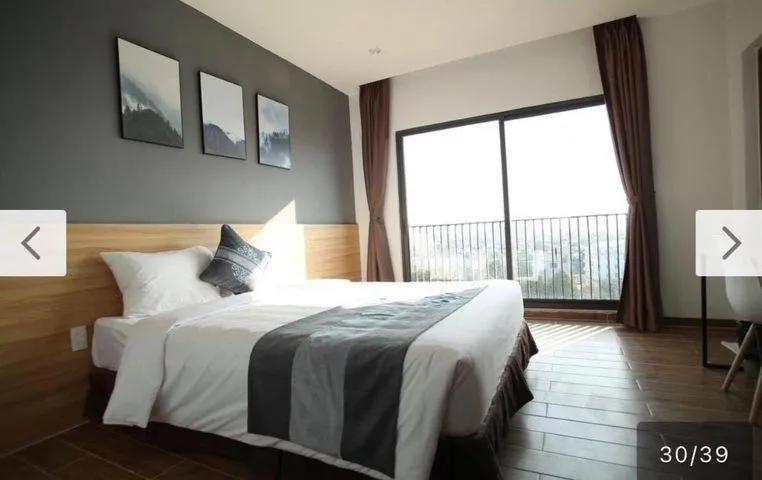 Bed in KingSales Hotel