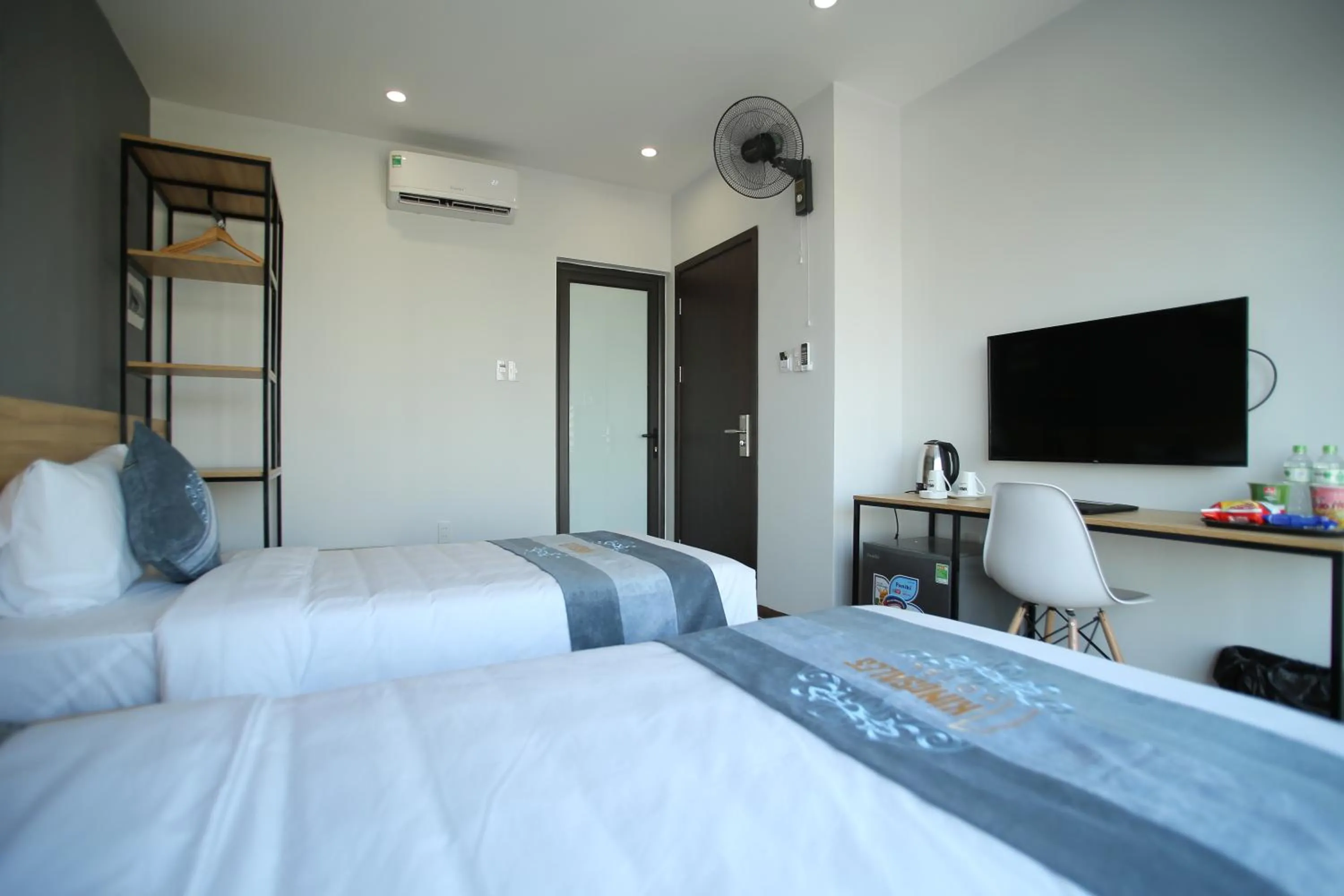 Bed in KingSales Hotel