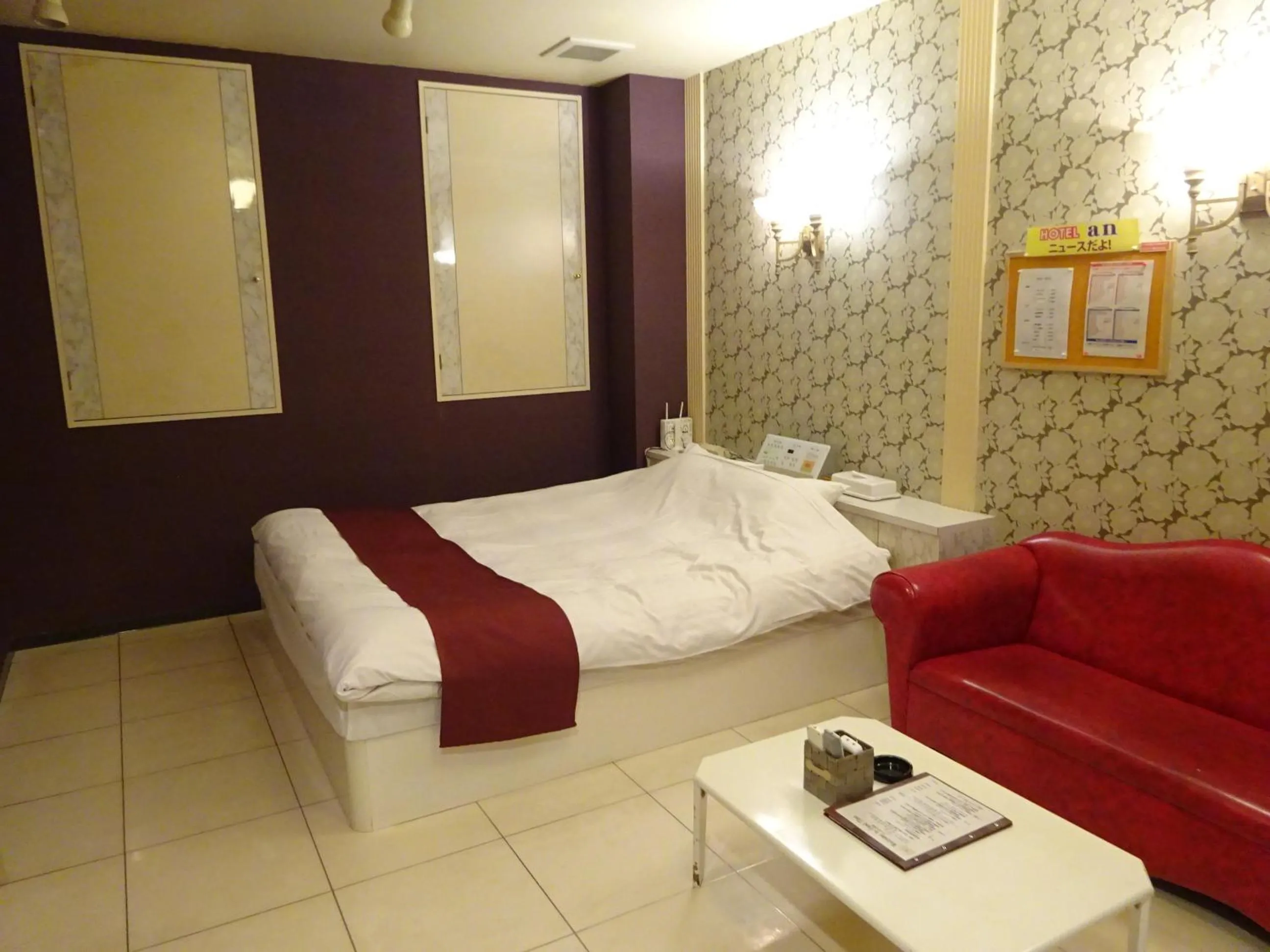 Bed in HOTEL Rplus Higashimatsuyama