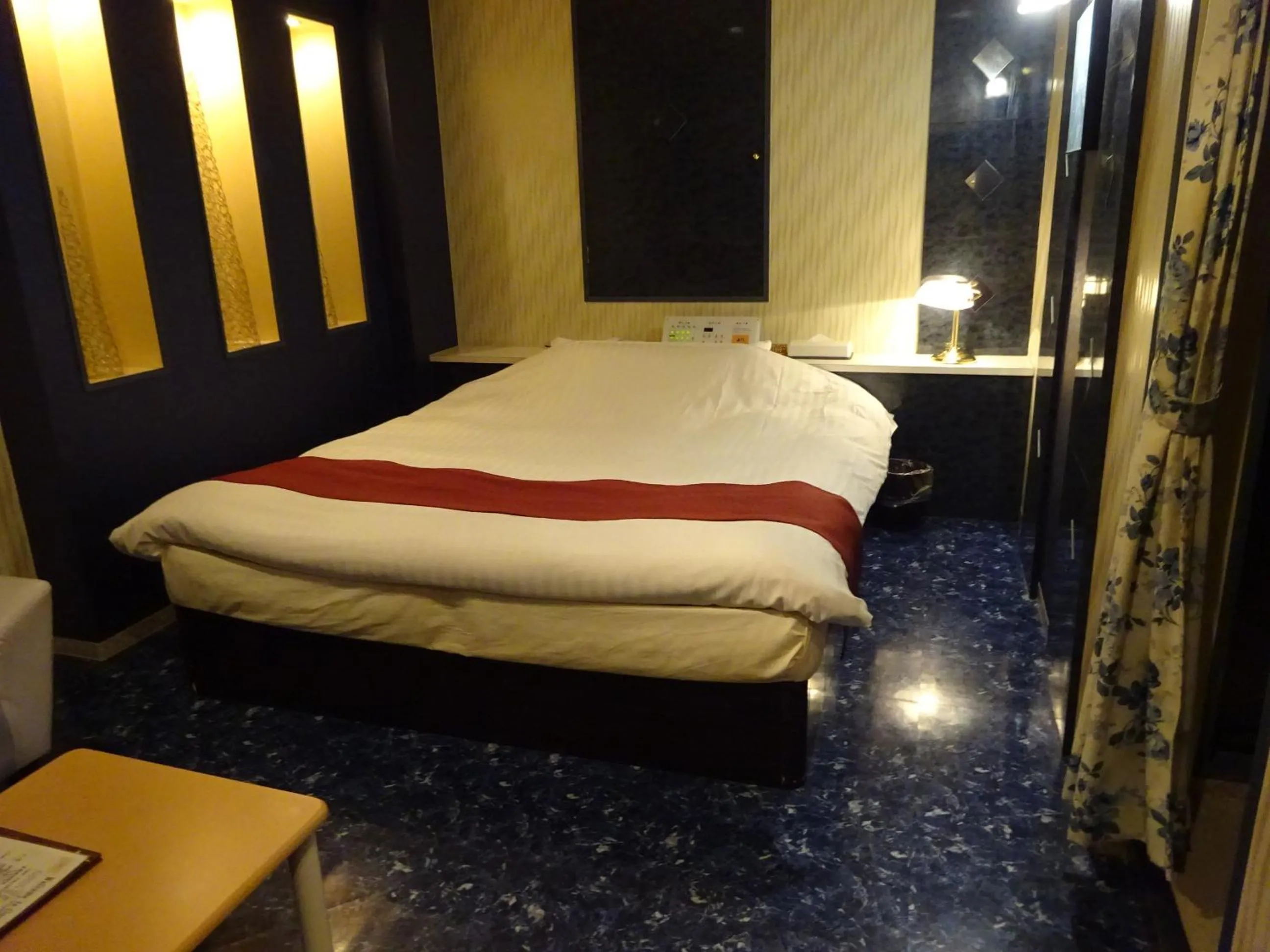 Bed in HOTEL Rplus Higashimatsuyama