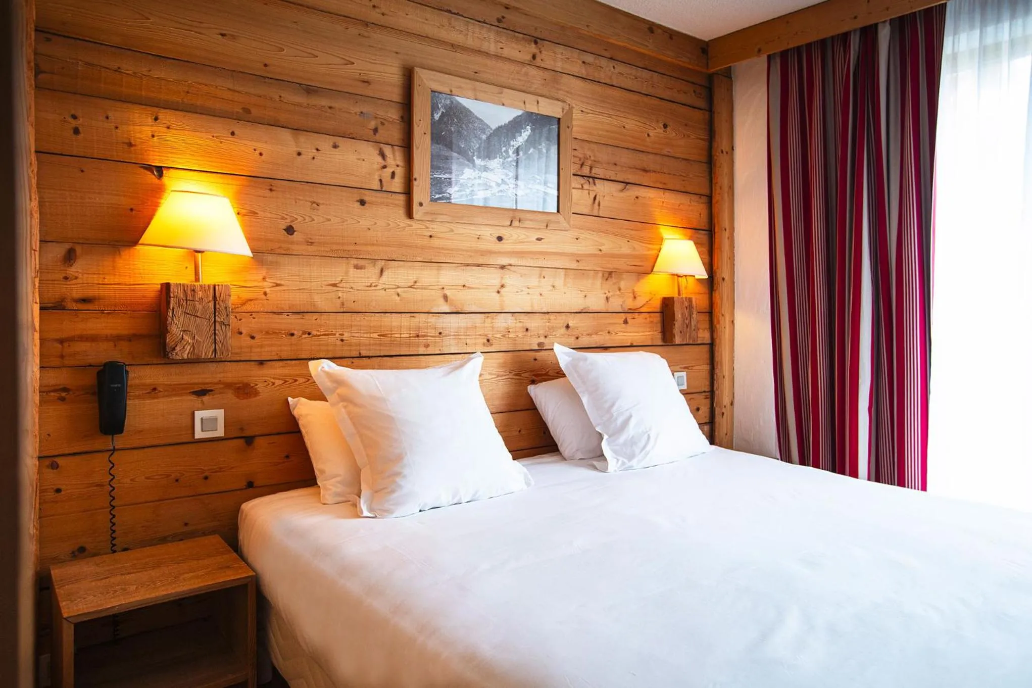 Bed in Hotel Alpen Roc