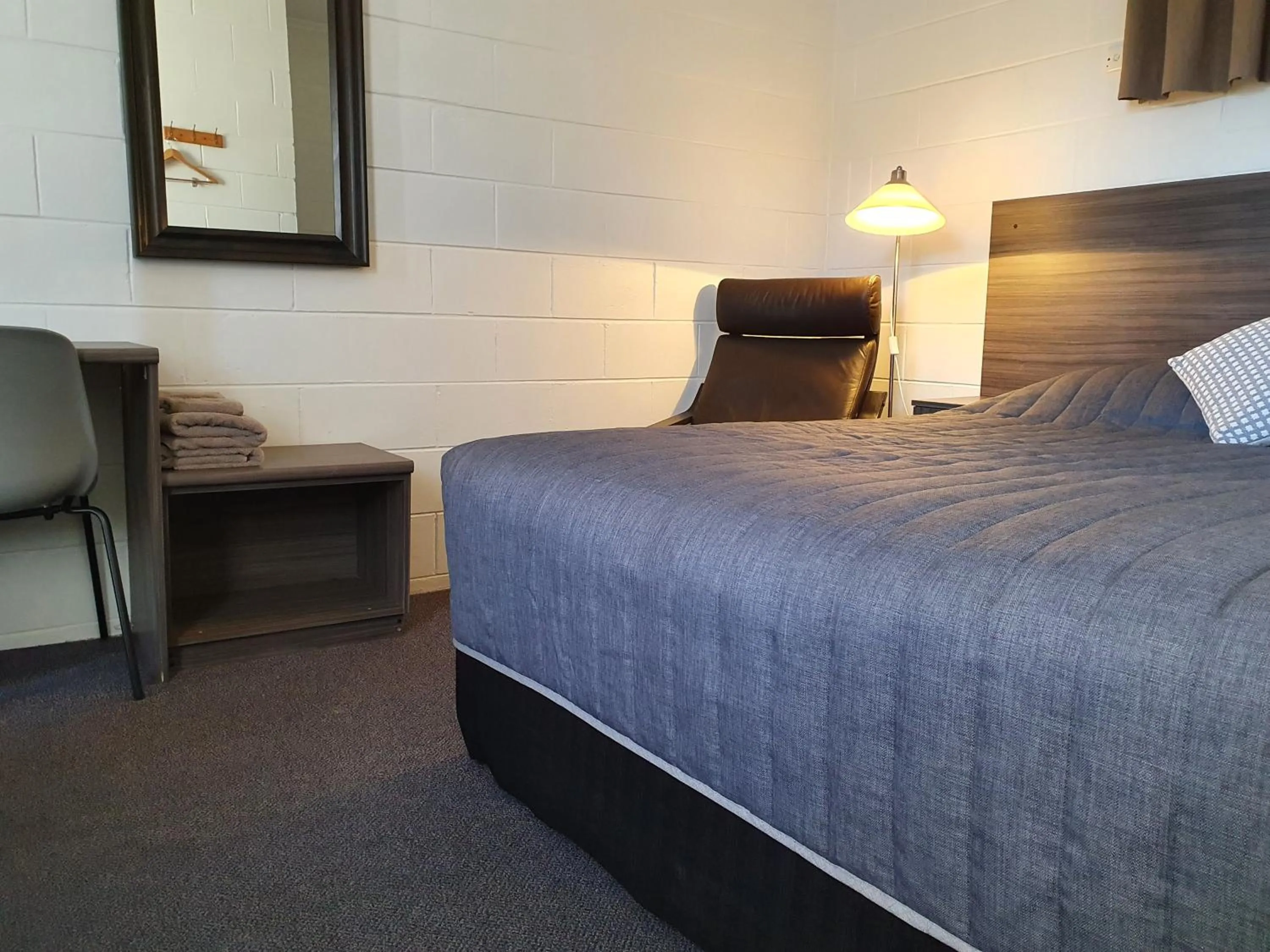 Bed in Motel Riverbend