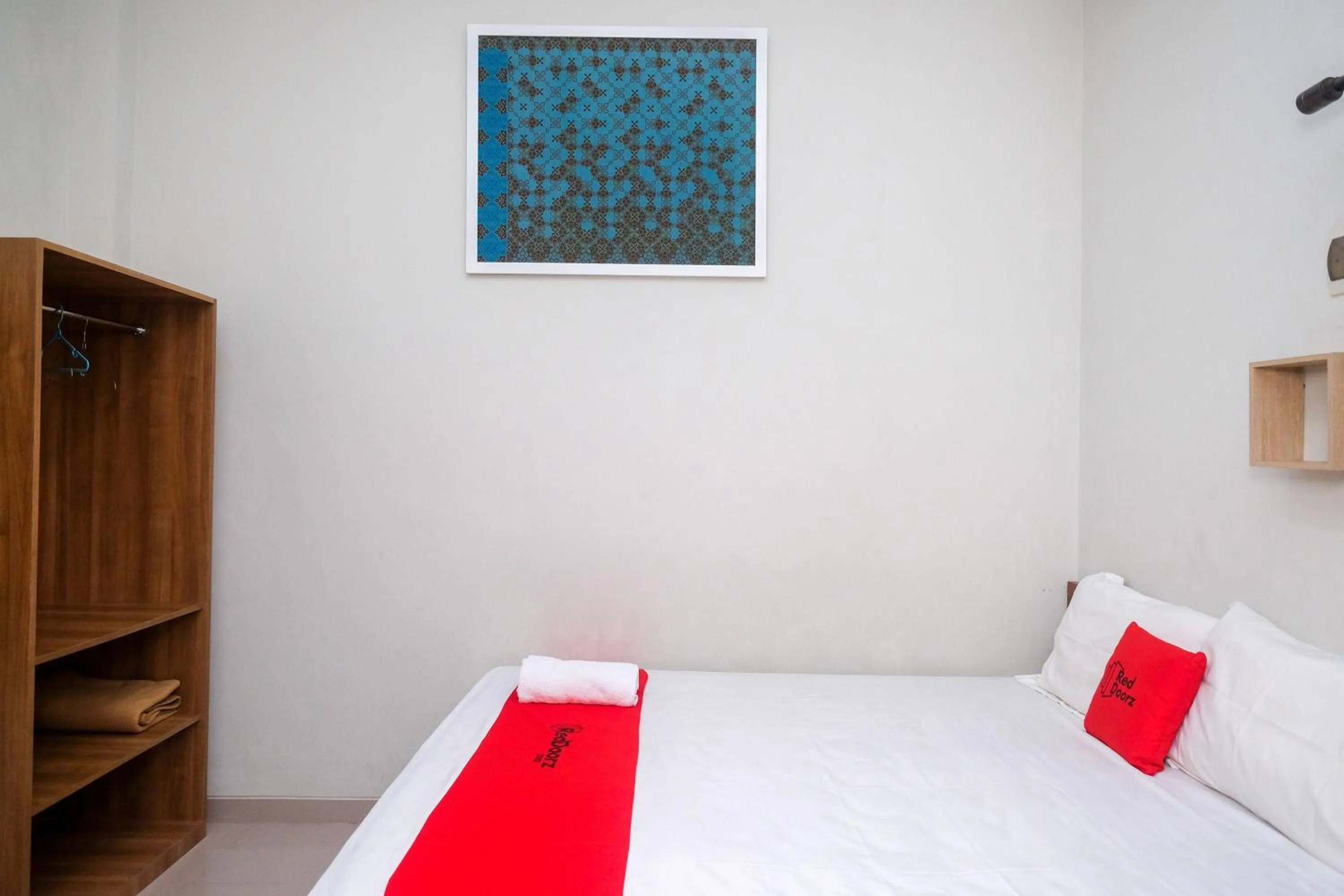 Bed in RedDoorz Syariah near Pascasarjana UGM 3