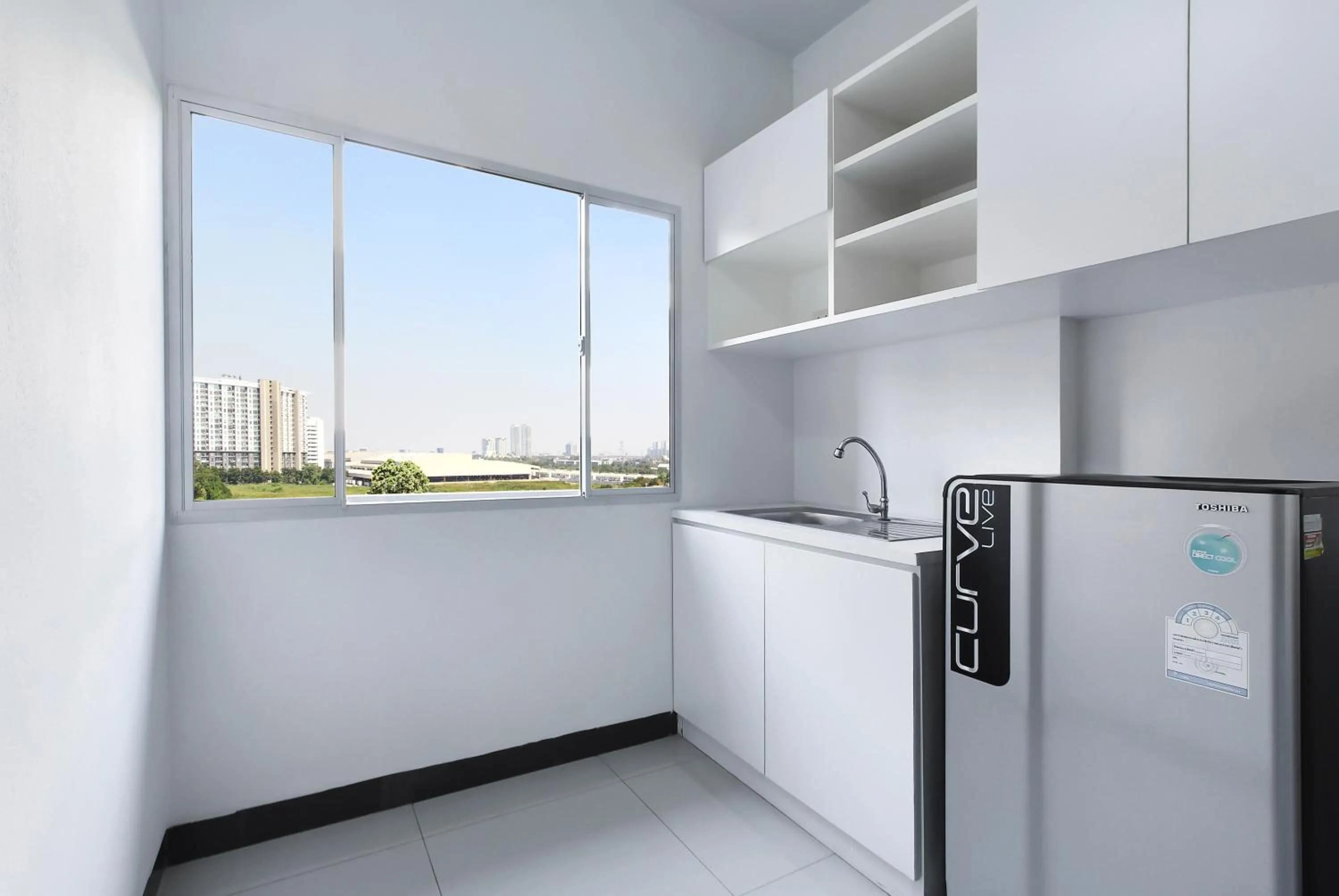 Kitchen or kitchenette in Fullroom 77 Srinakarin