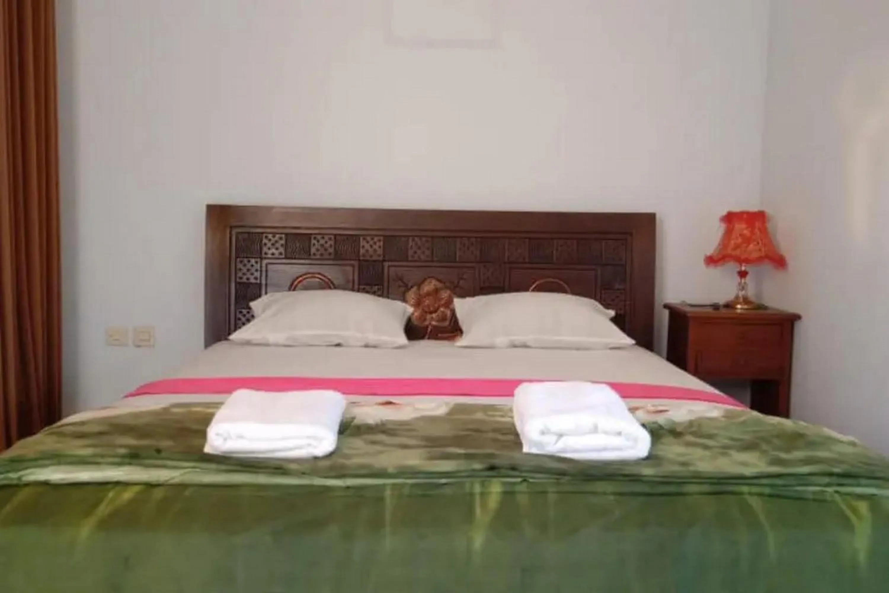 Bed in Puri Karimunjawa RedPartner