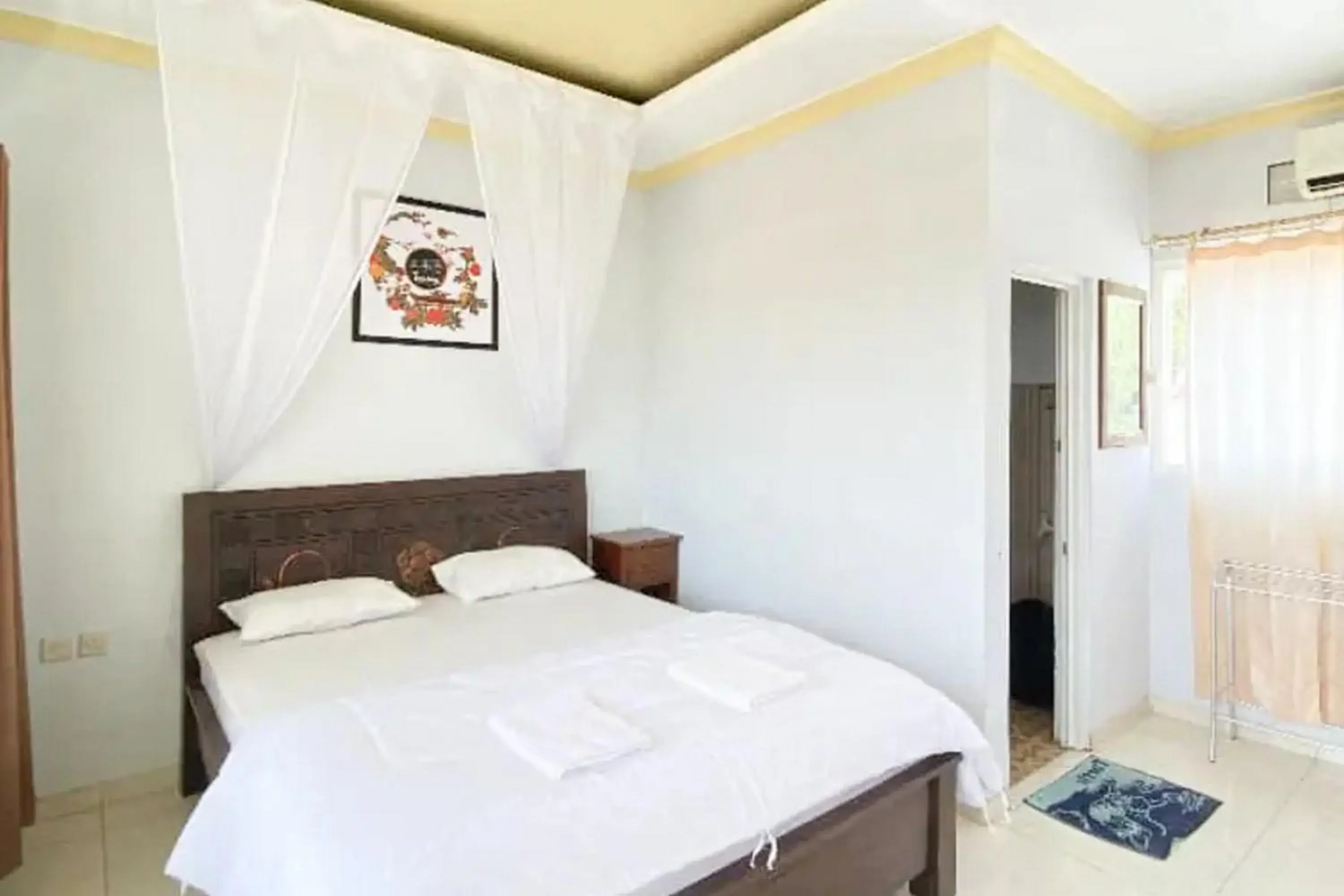 Standard Double Room in Puri Karimunjawa RedPartner Standard Double Room in Puri Karimunjawa RedPartner