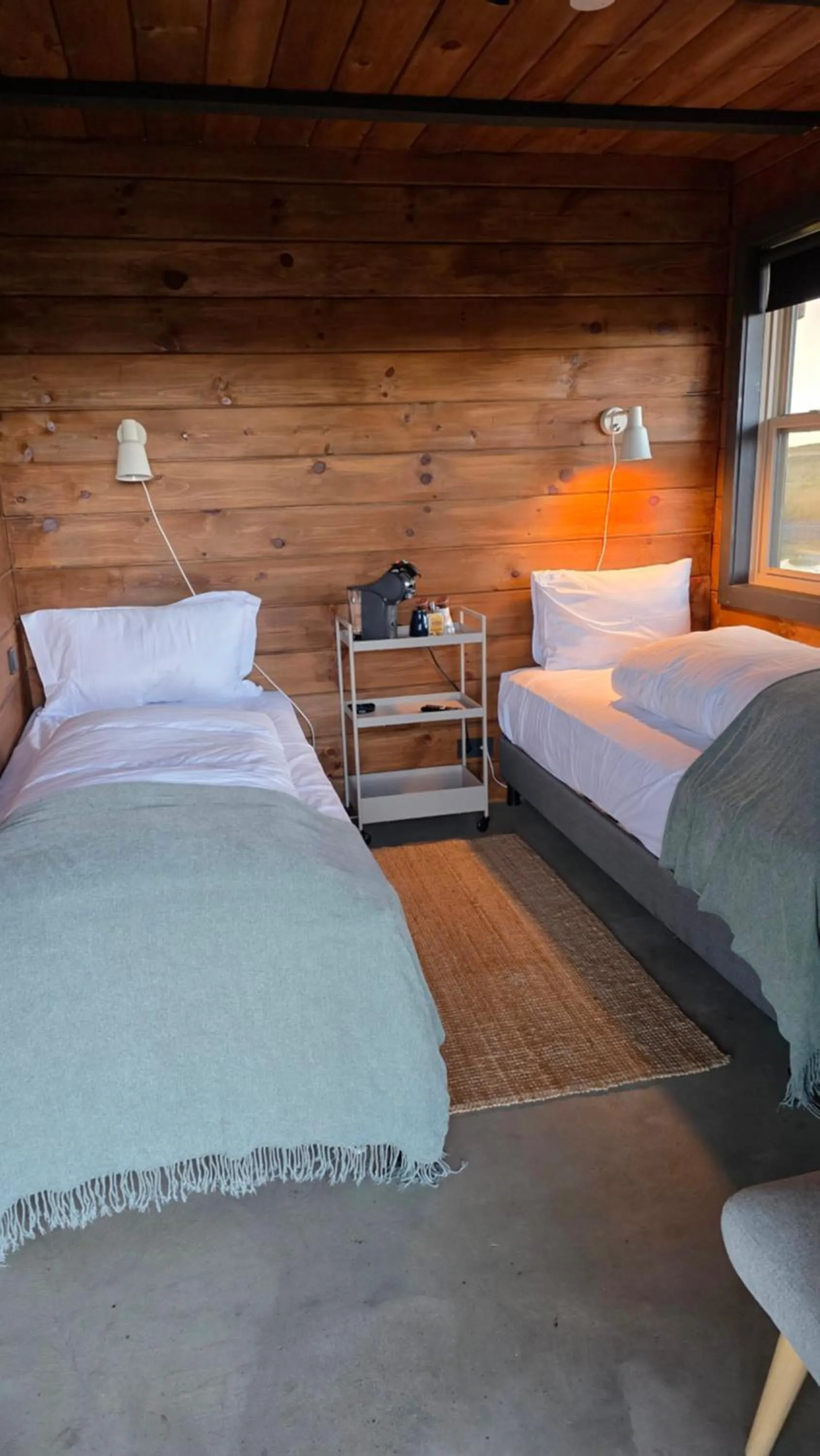 Bed in Riverfront Lodge Hella