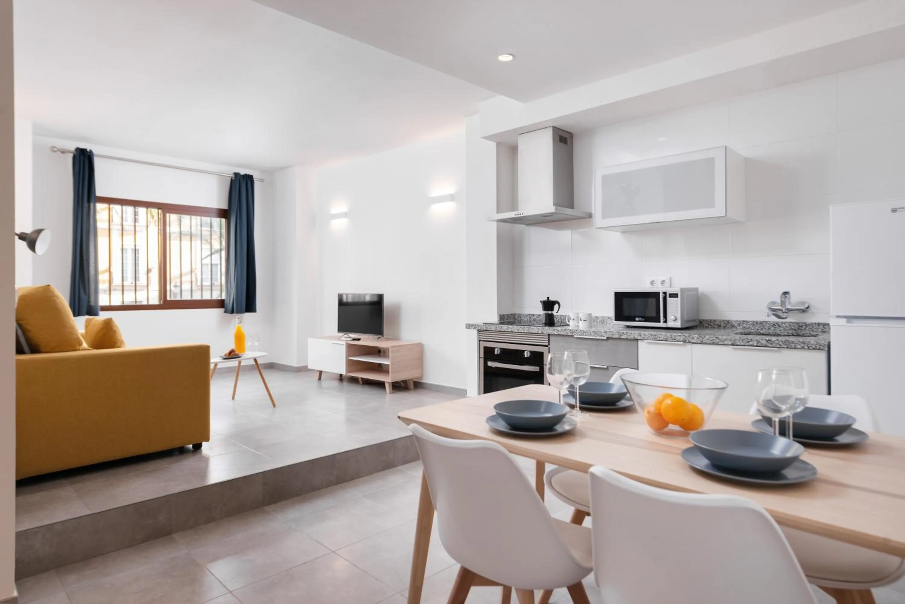 Kitchen or kitchenette in Apartamentos Quijano by Be Alicante