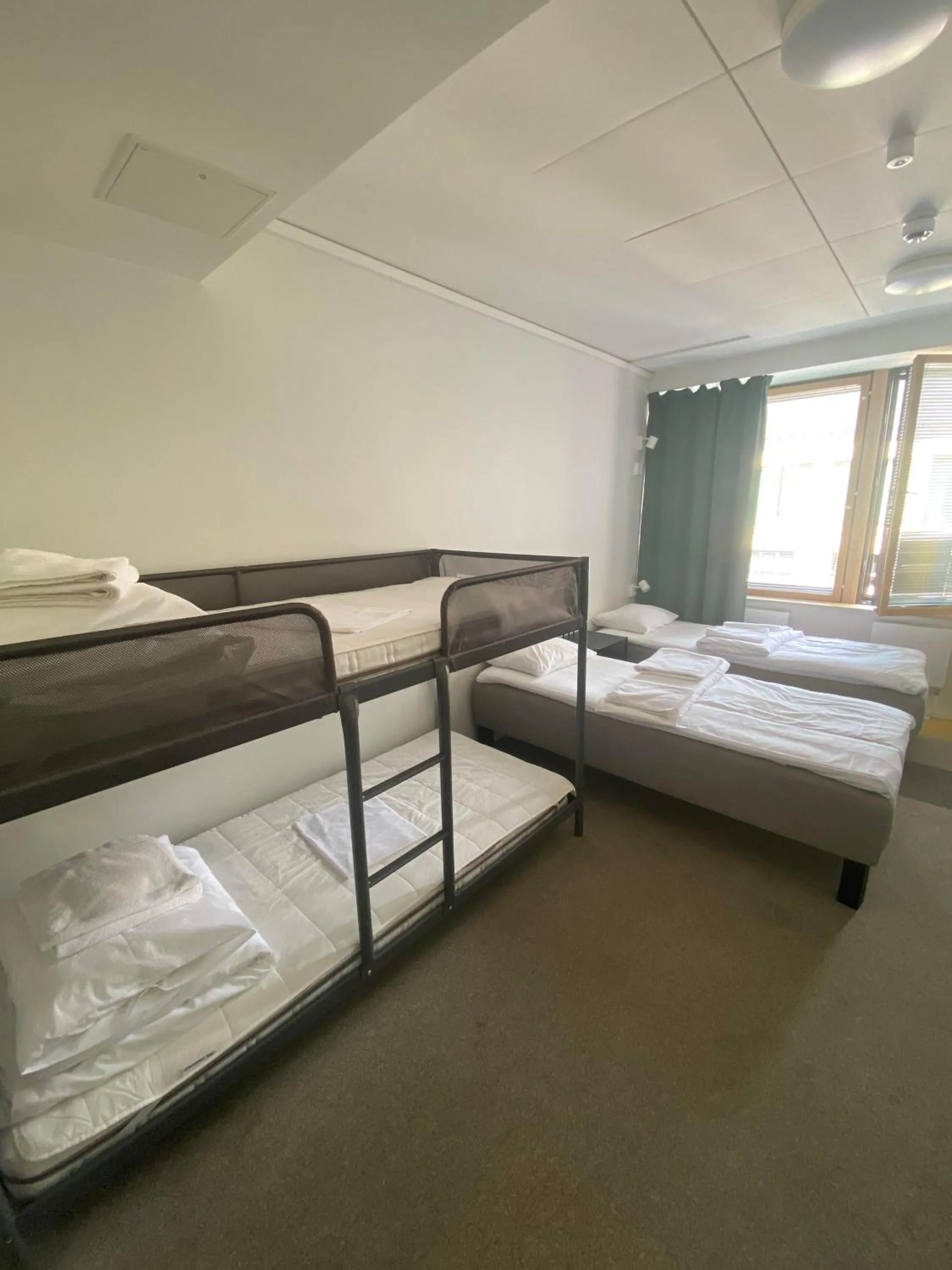 Photo of the whole room, Bed in Aikatalo Hostel Helsinki