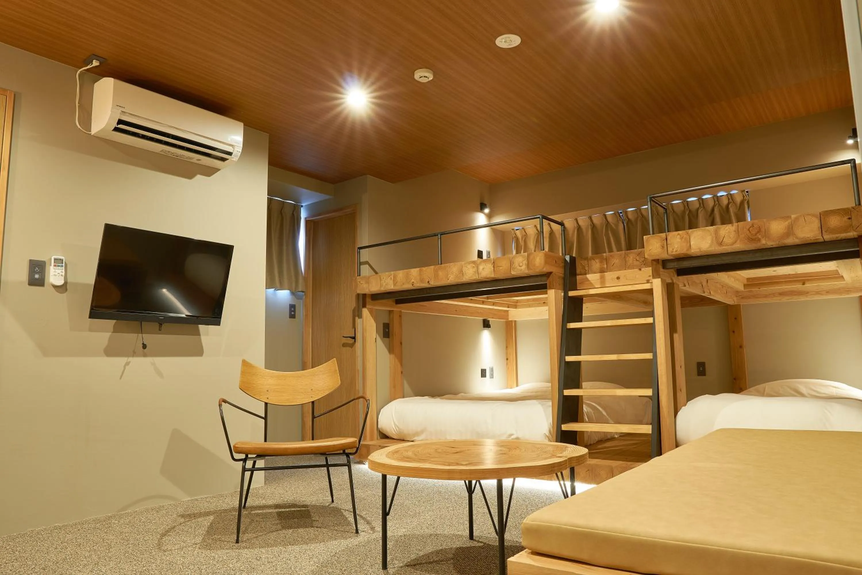 Seating area, Bed in mizuka Daimyo 7 - unmanned hotel -