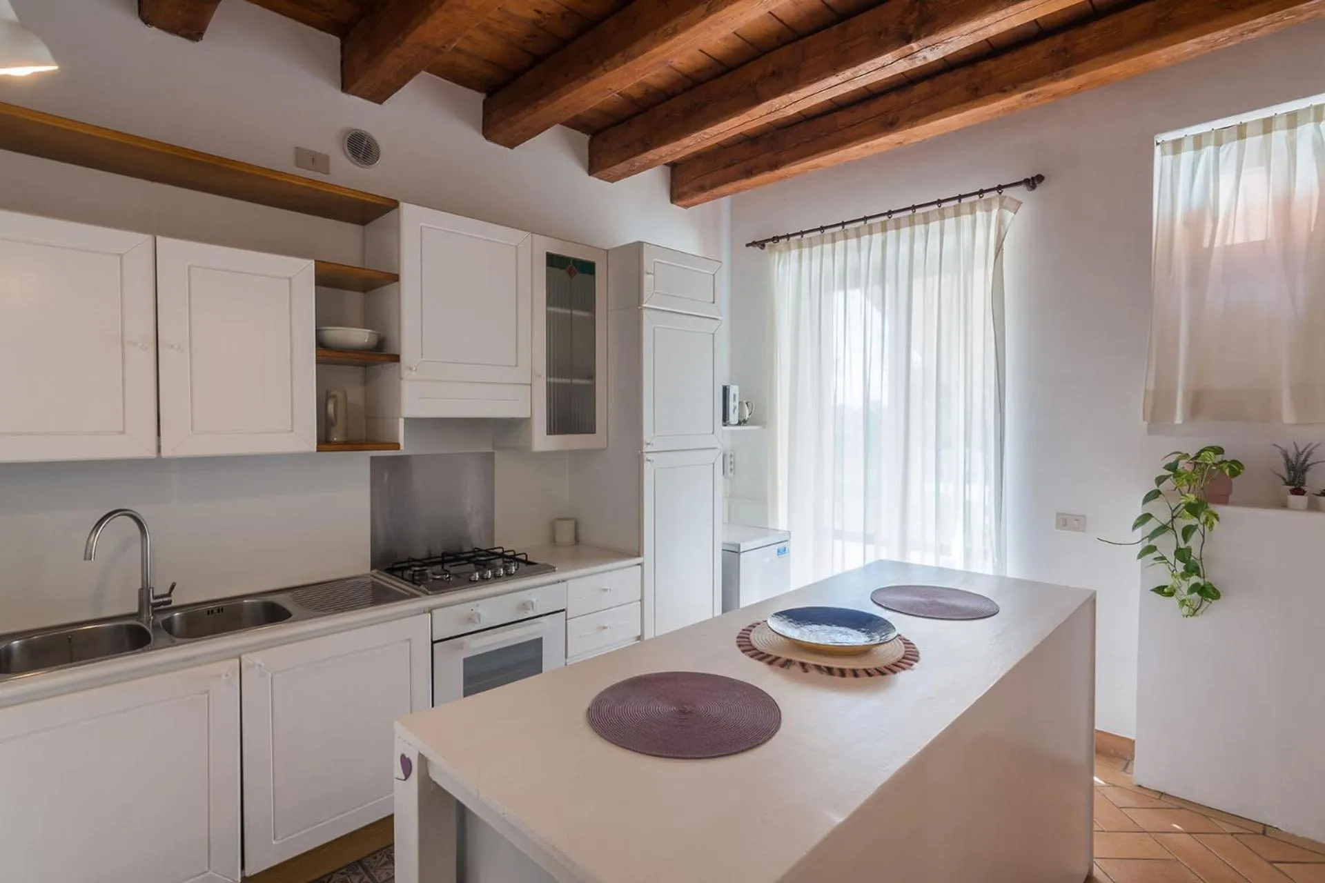 Kitchen or kitchenette in Casa Rossa