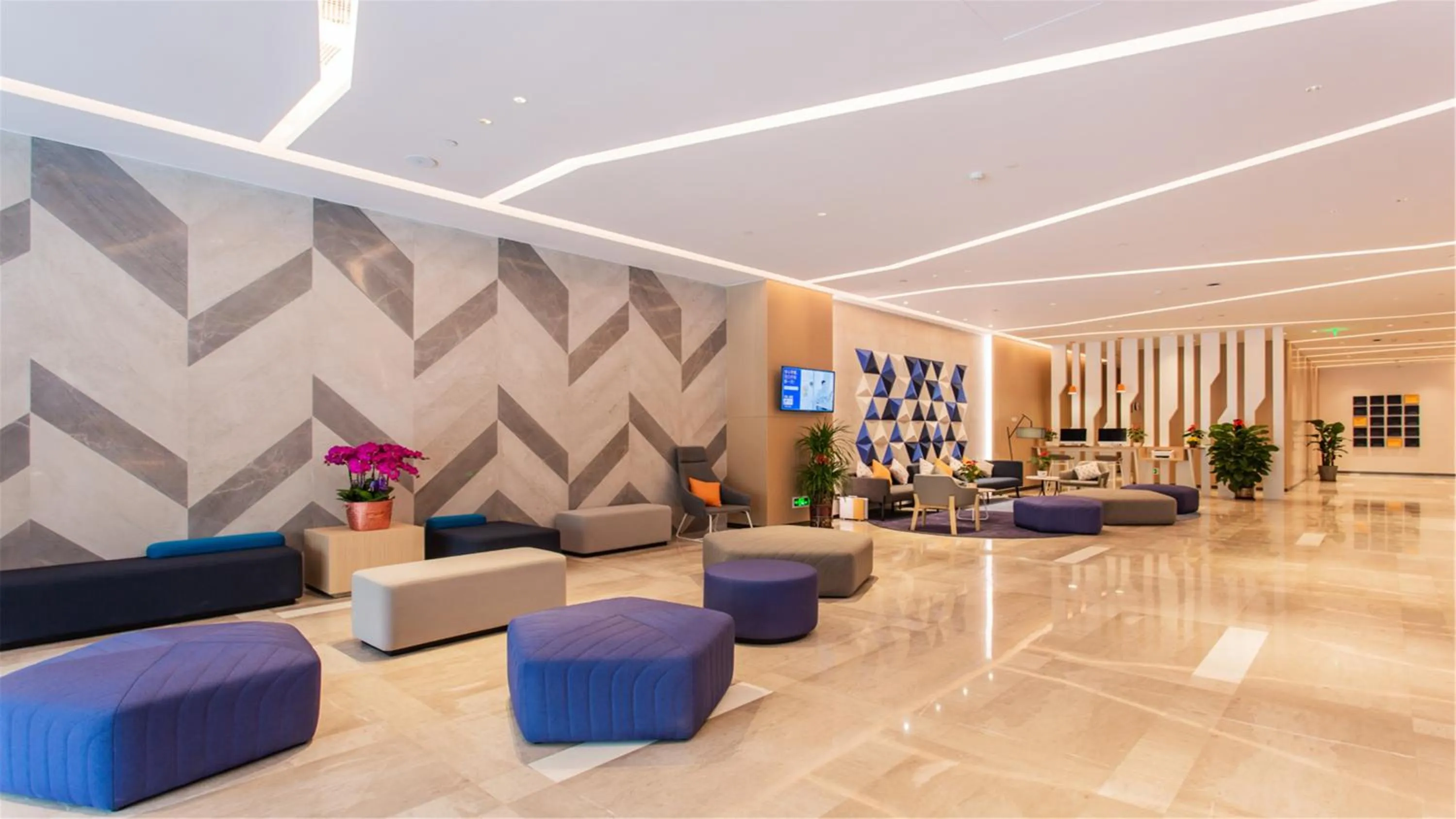Seating area in Holiday Inn Express Jiangmen Jianghai by IHG