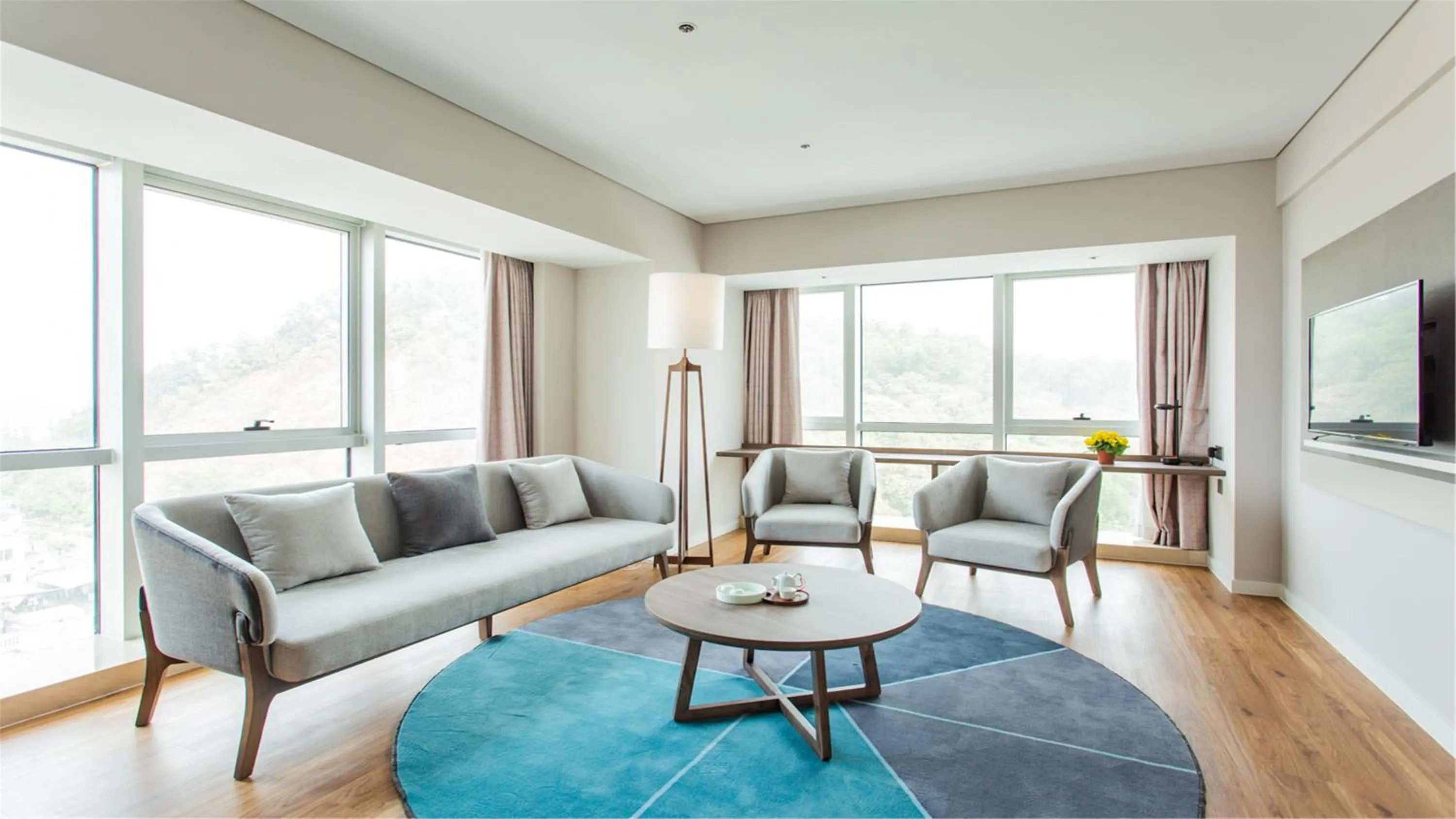 Living room in Holiday Inn Express Jiangmen Jianghai by IHG