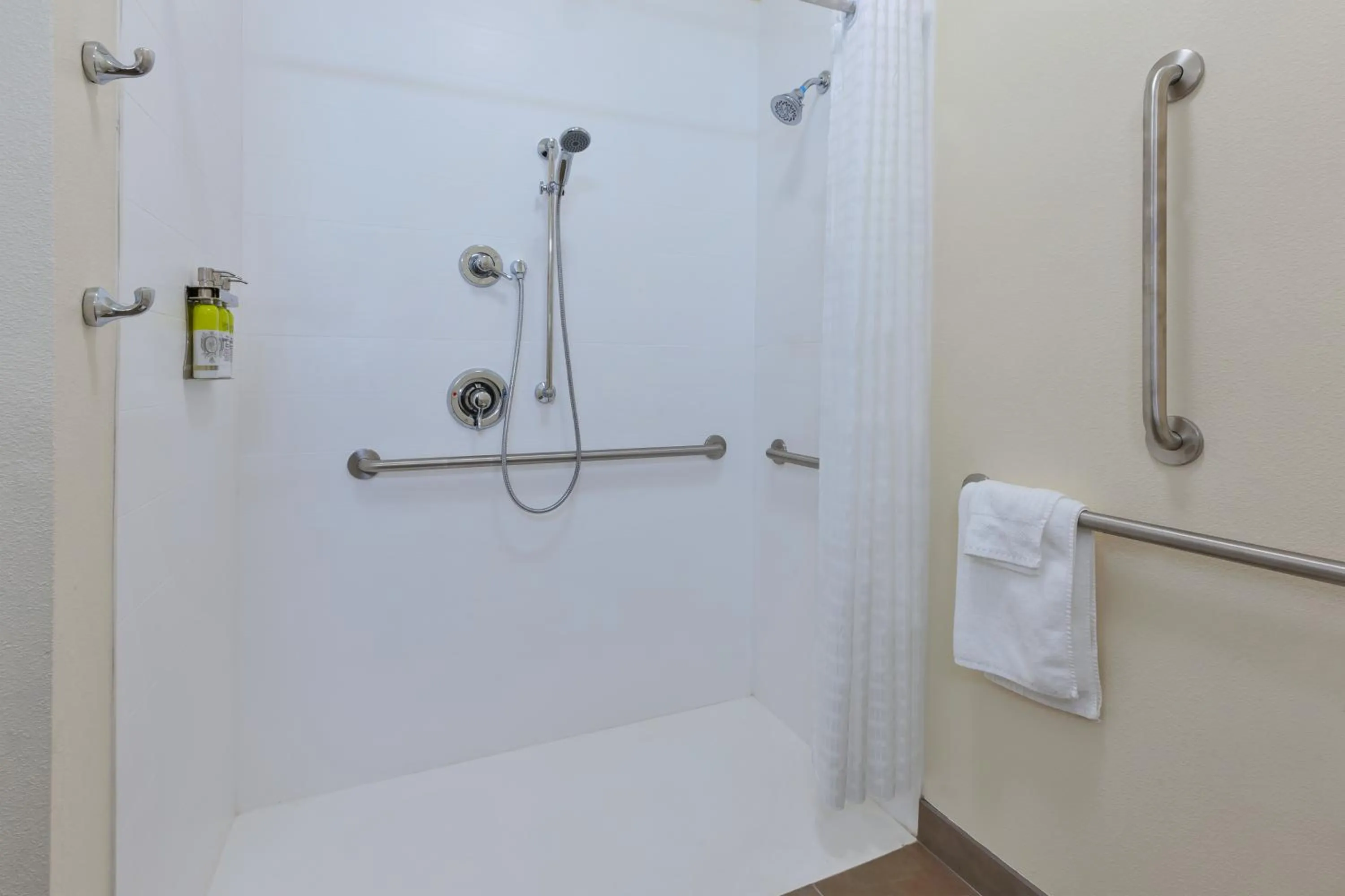 Shower in Candlewood Suites Louisville - NE Downtown Area by IHG