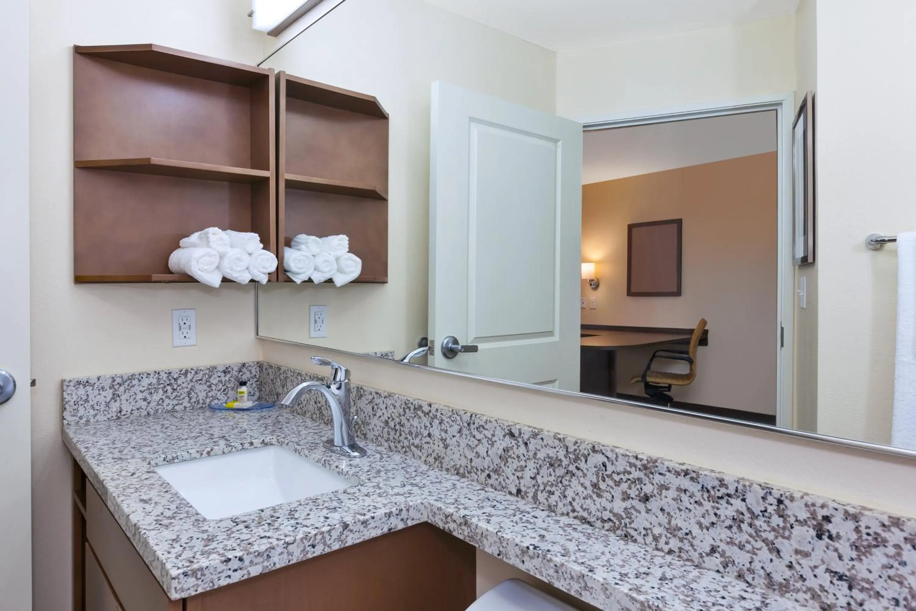 Bathroom in Candlewood Suites Louisville - NE Downtown Area by IHG