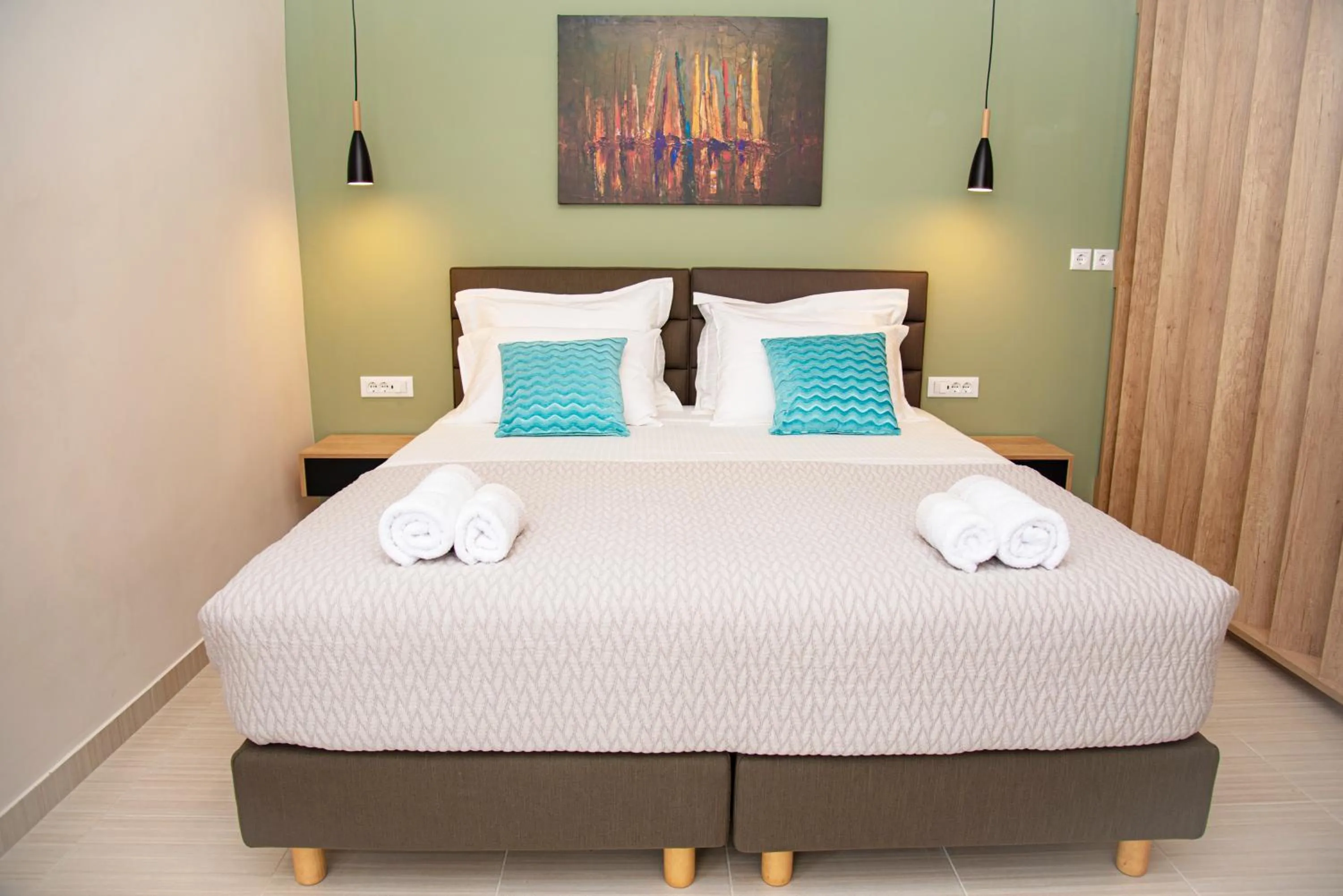 Bed in Kassiopi Luxury Suites