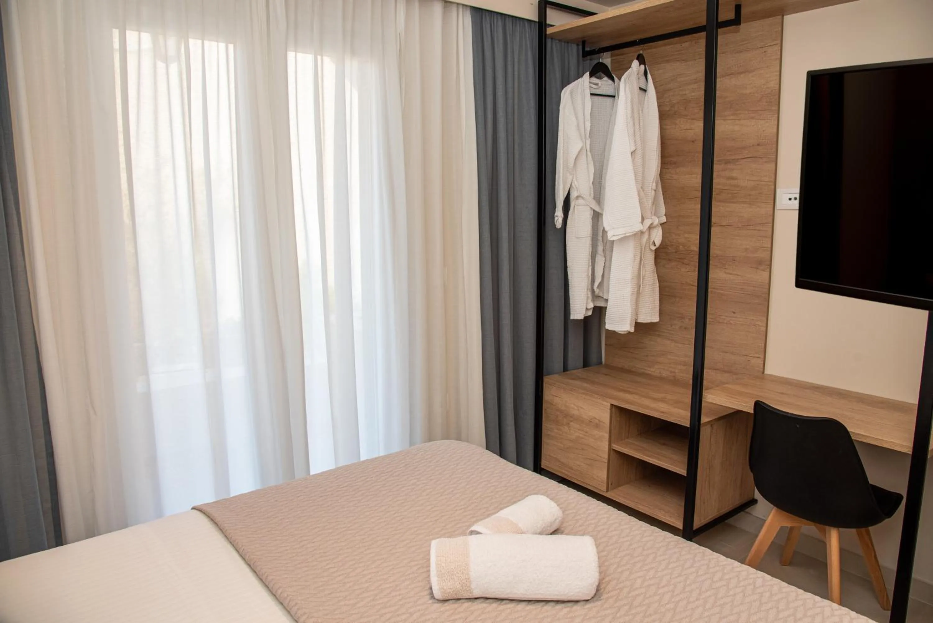 Bed in Kassiopi Luxury Suites