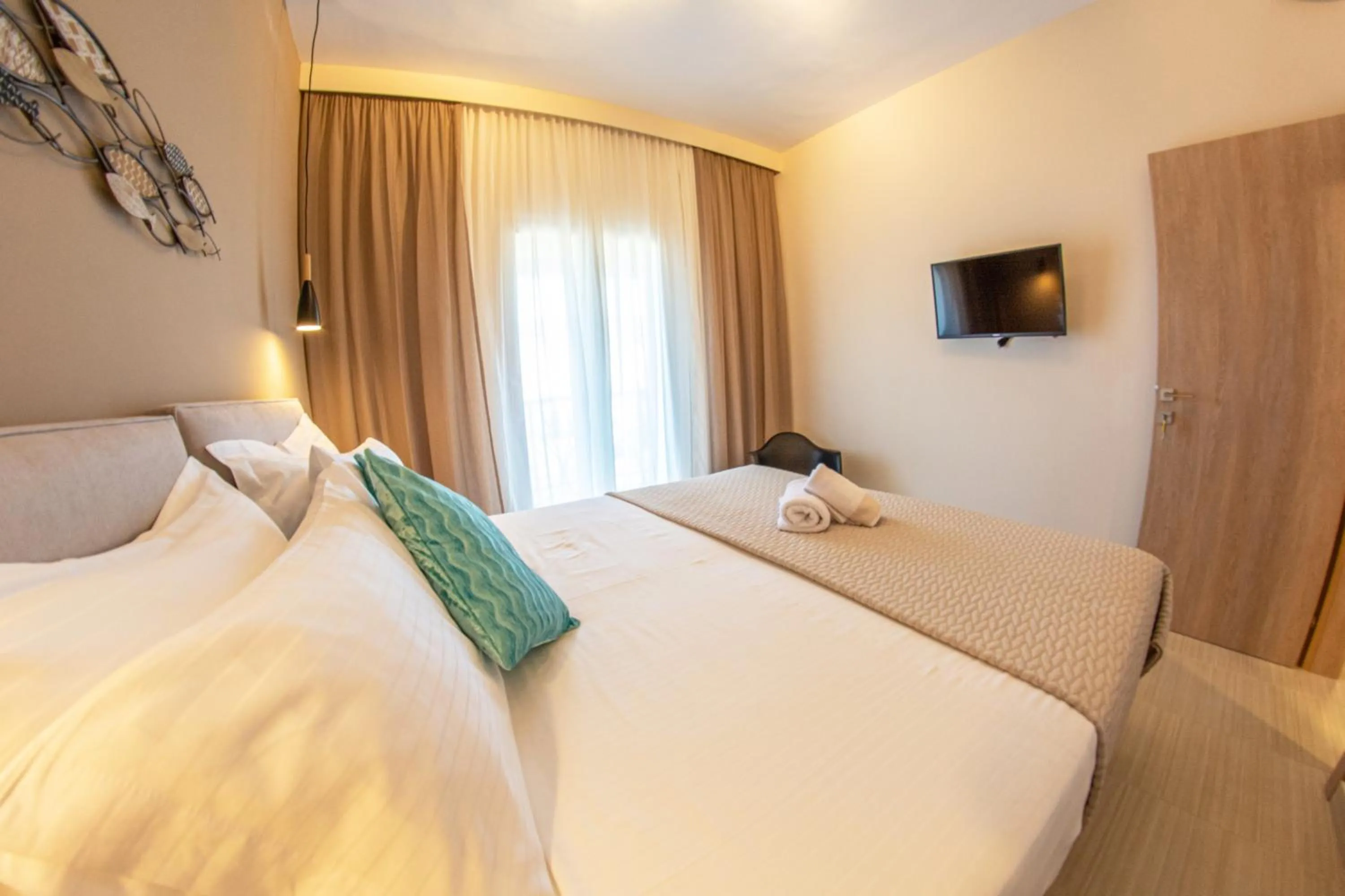 Bed in Kassiopi Luxury Suites