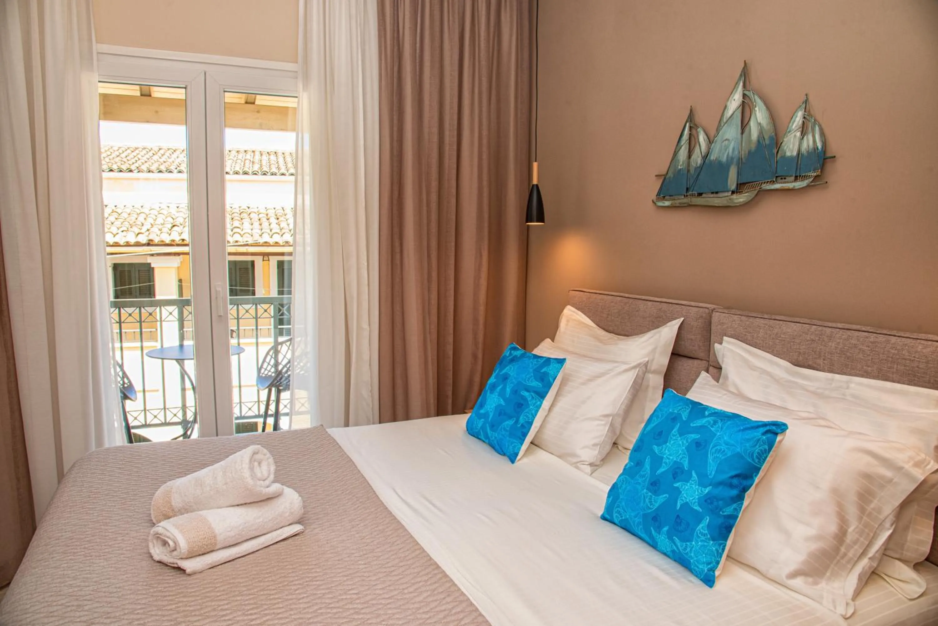 Bed in Kassiopi Luxury Suites