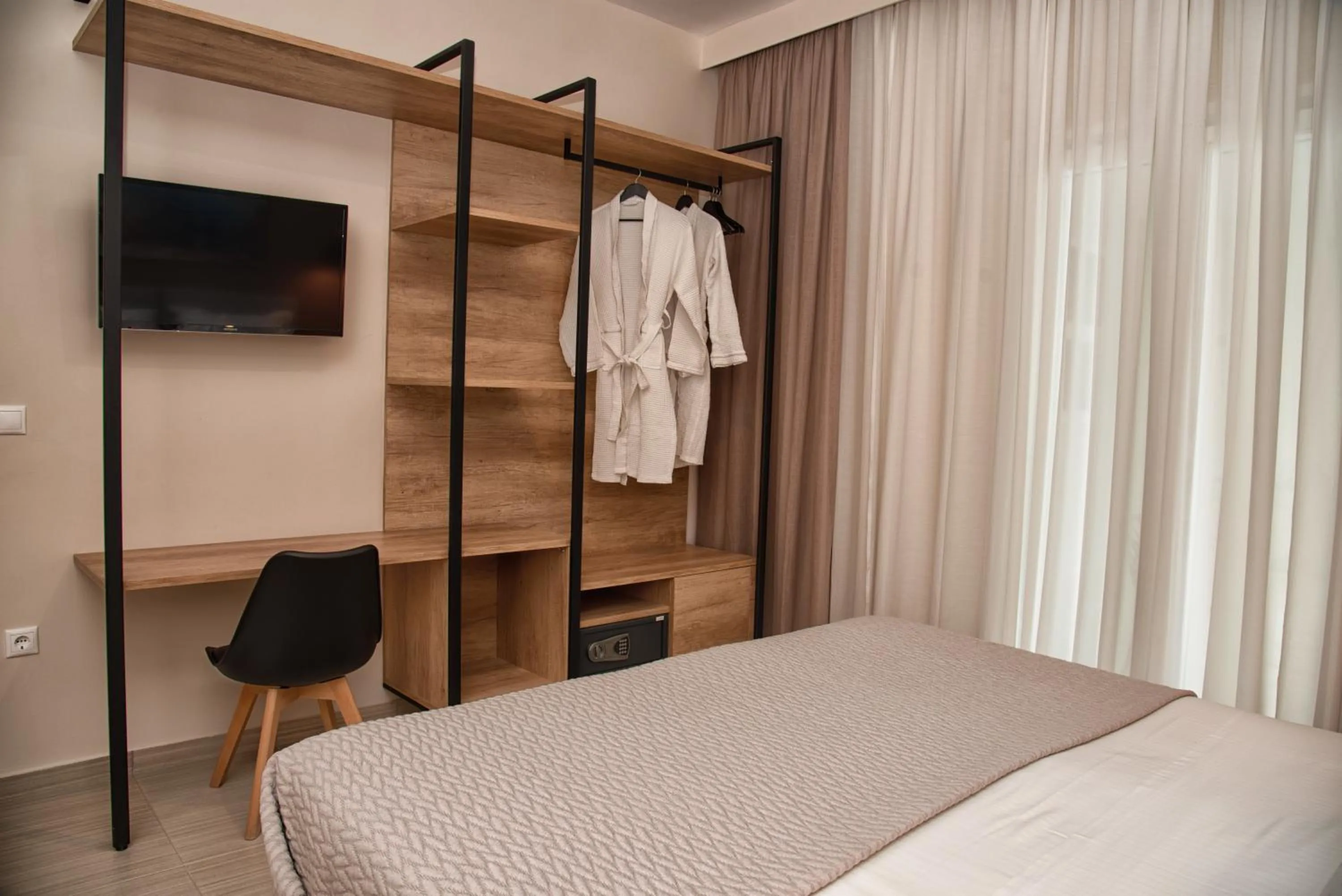 Bed in Kassiopi Luxury Suites