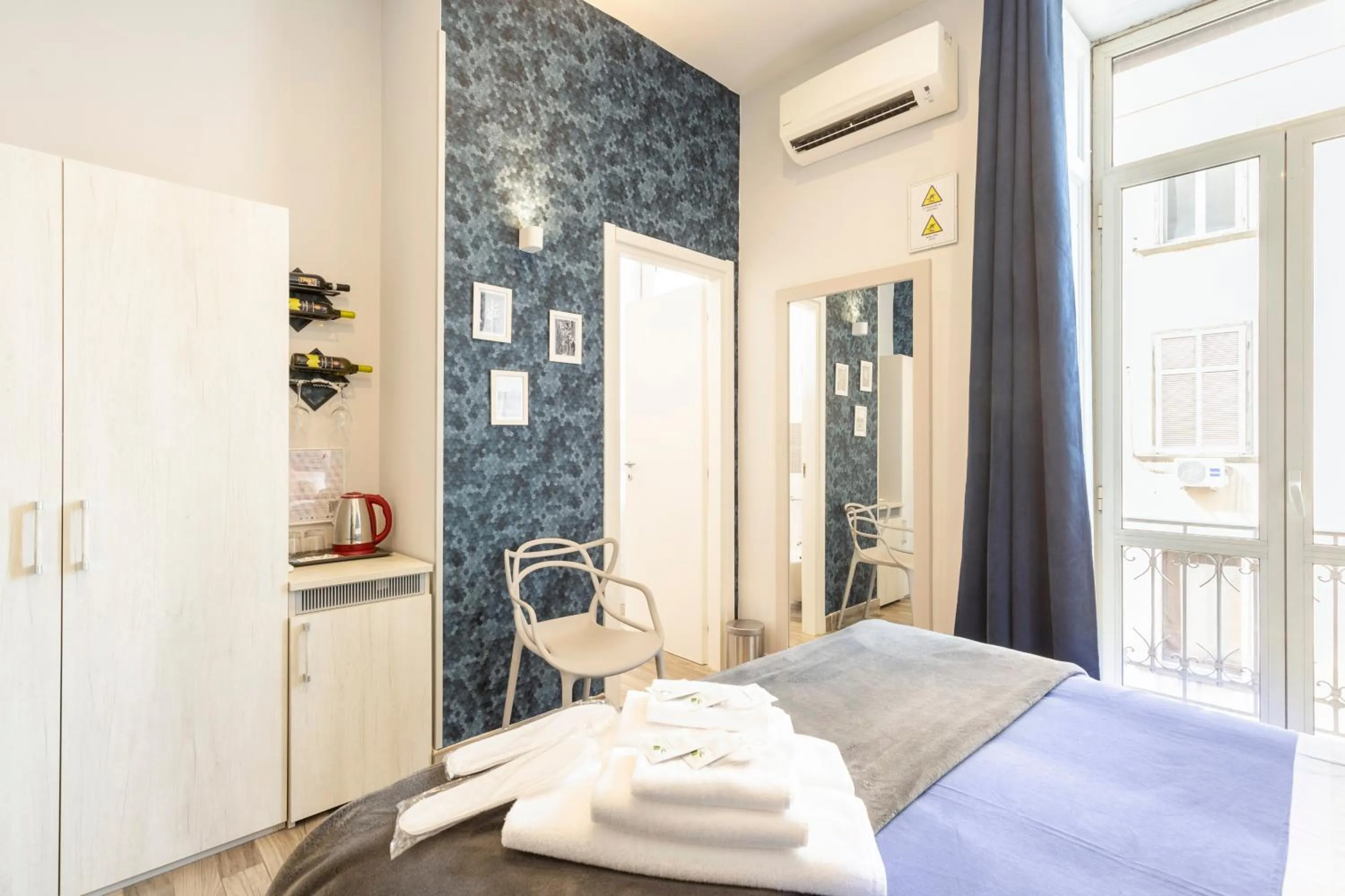 Bed in Scaramantico Rooms