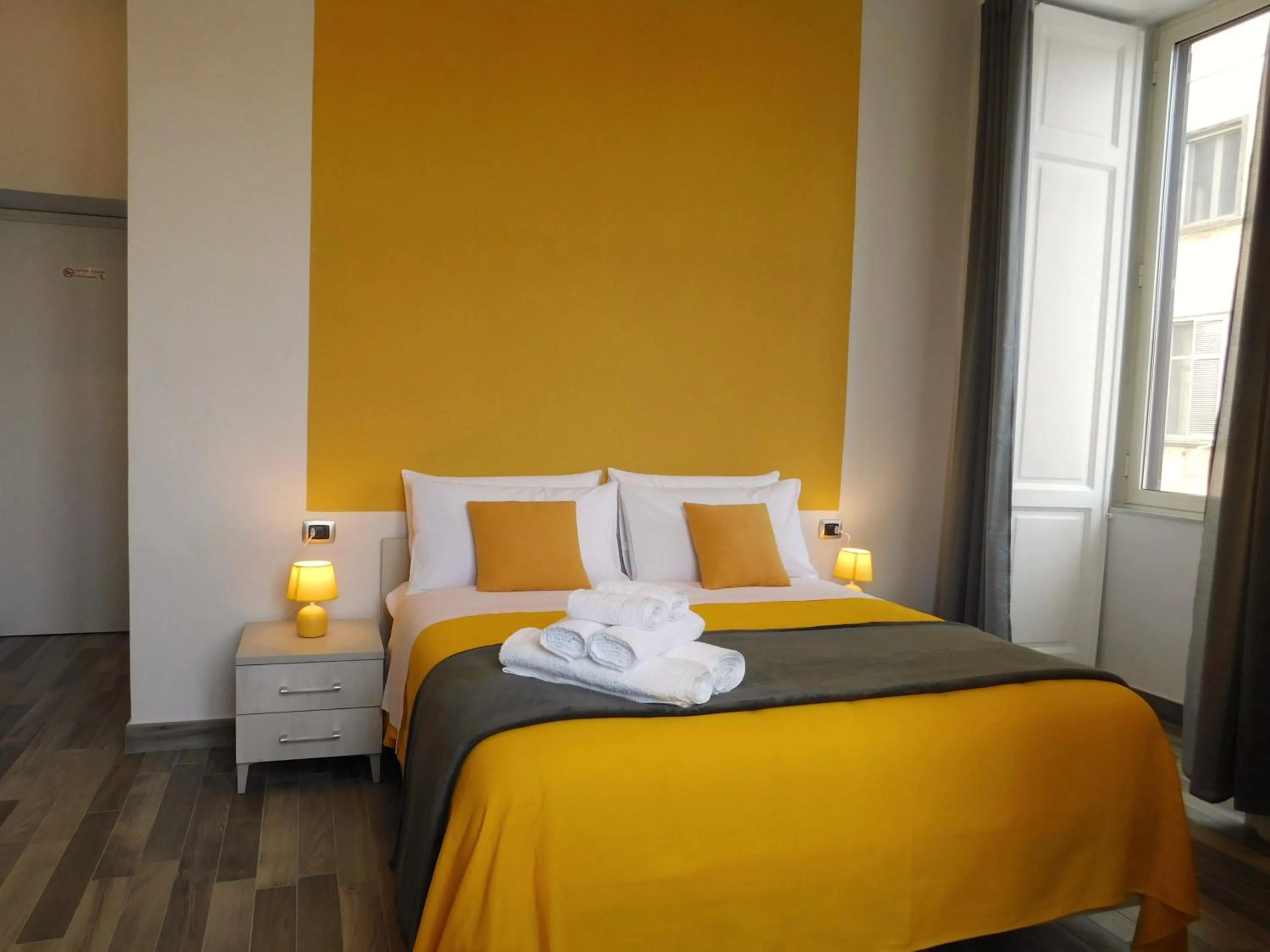 Bed in Scaramantico Rooms