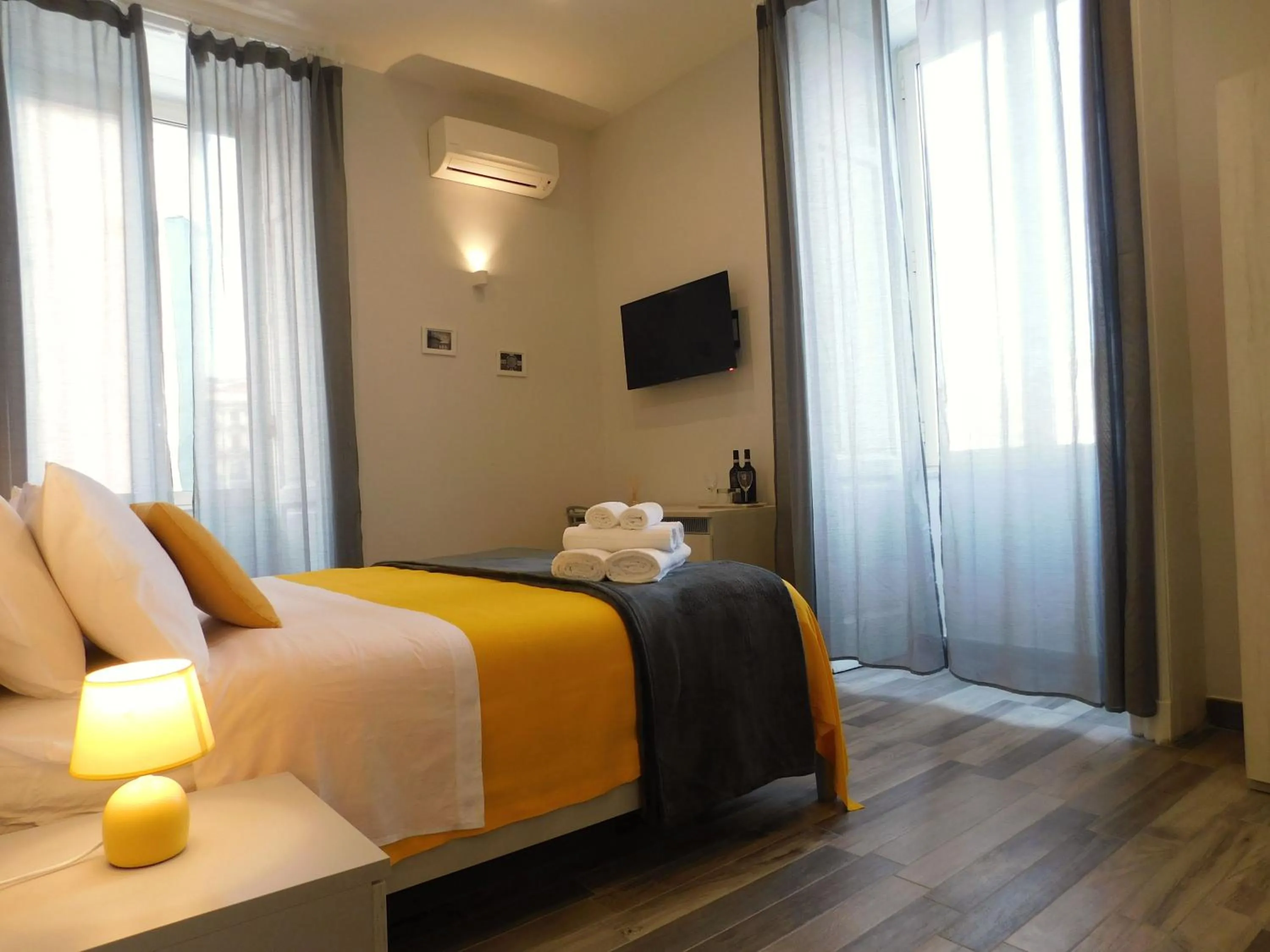 Bed in Scaramantico Rooms