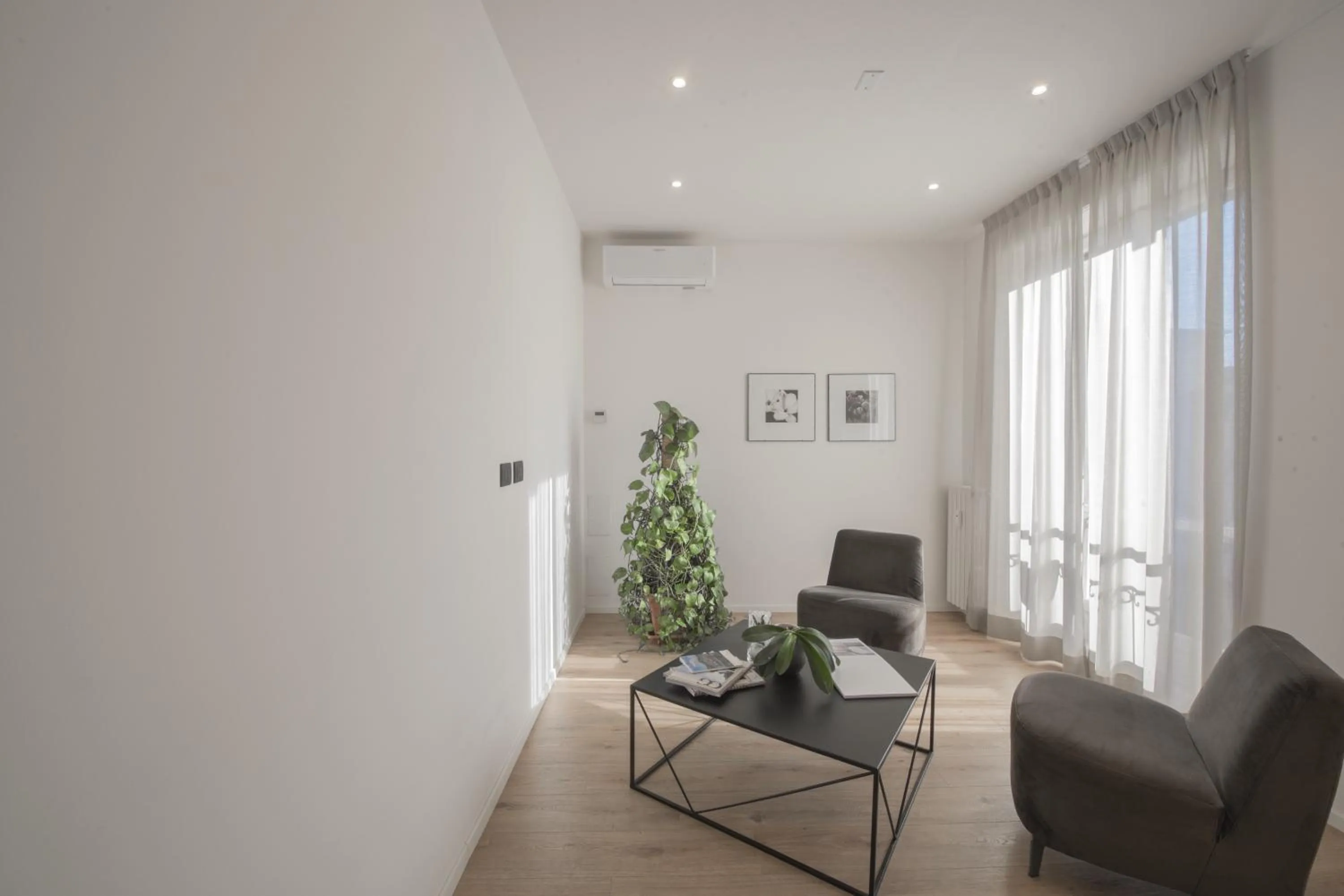 Communal lounge/ TV room in San Carlo Suite Torino