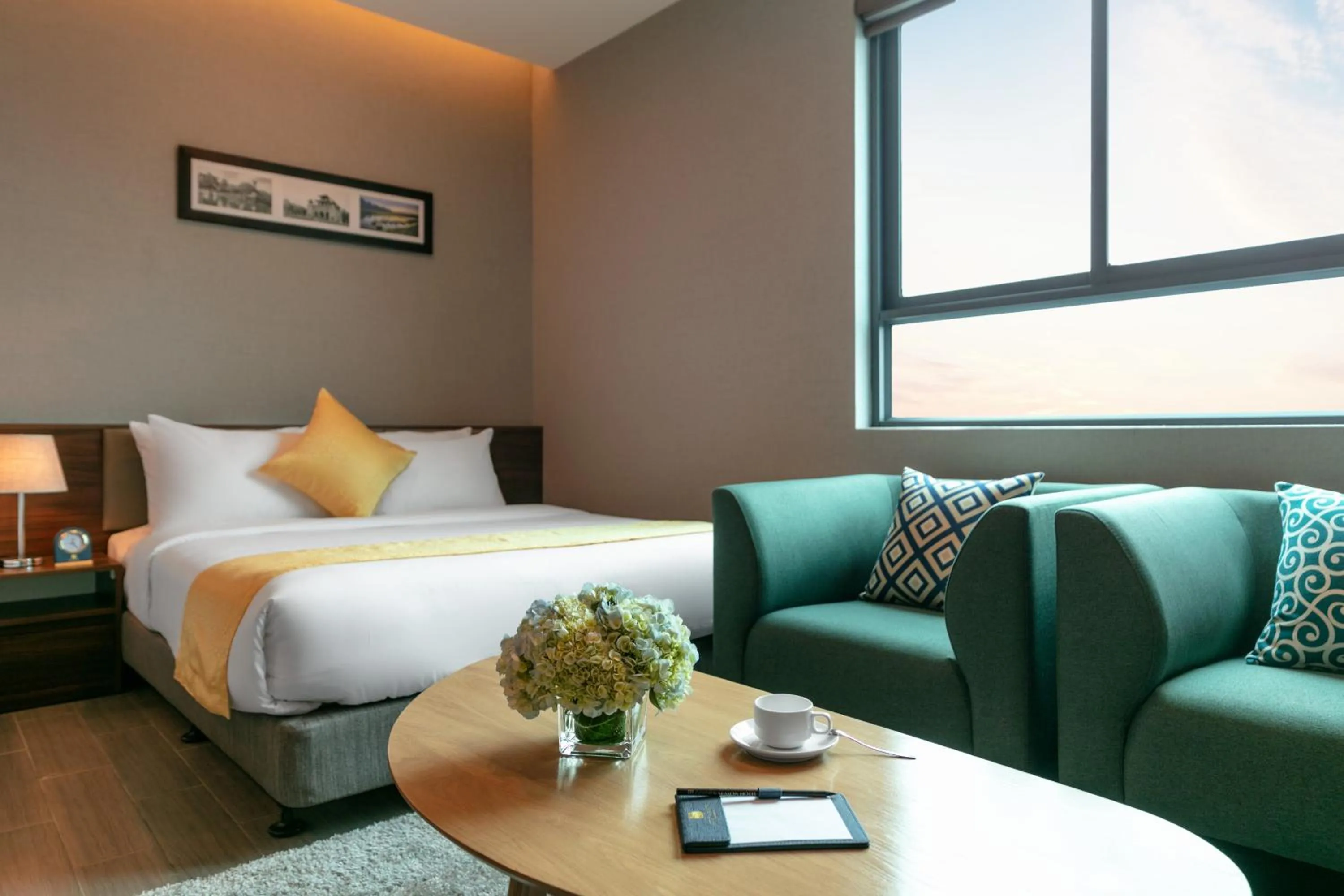 Seating area, Bed in Golden Season Hotel