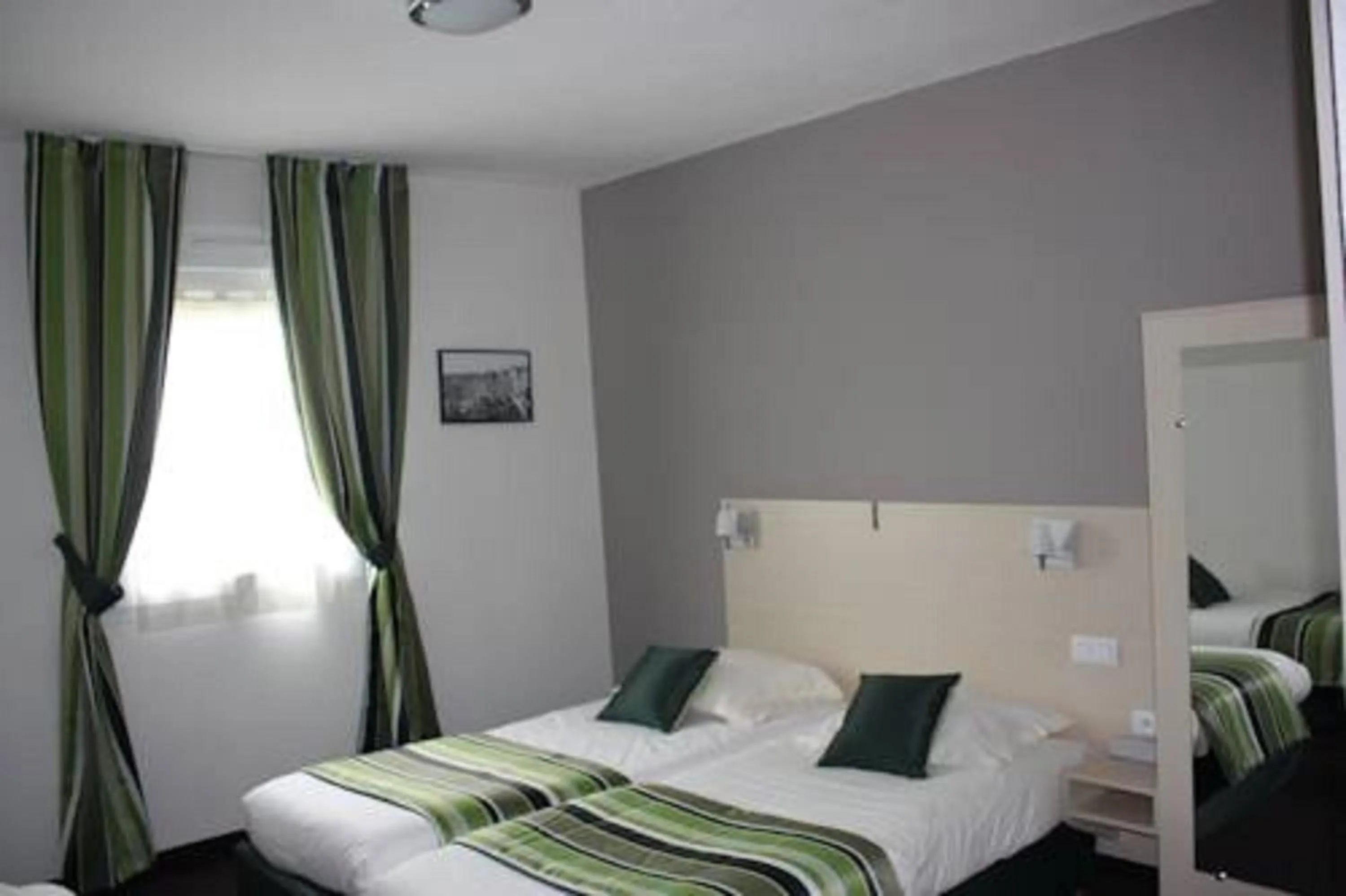 Photo of the whole room, Bed in The Originals Boutique Hôtel Spa Beuzeville Honfleur Sud