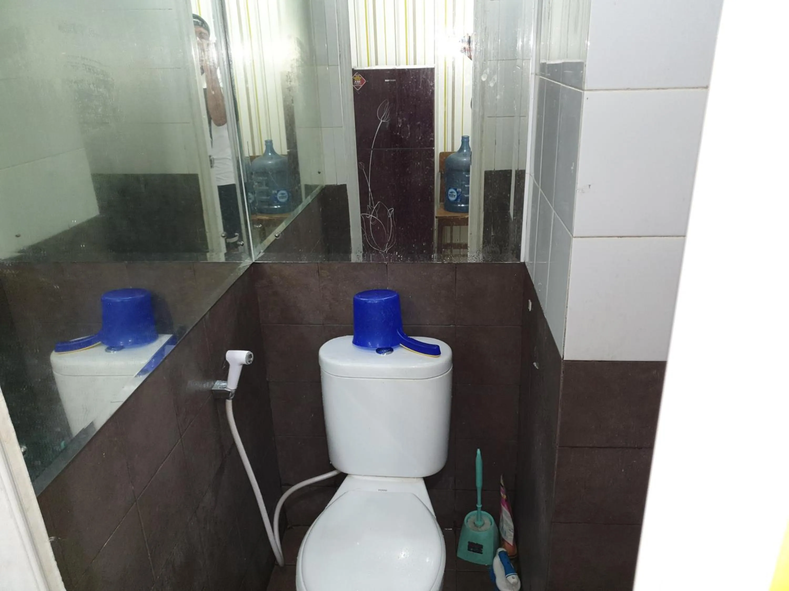 Bathroom in Green Pramuka Apartement By Vici