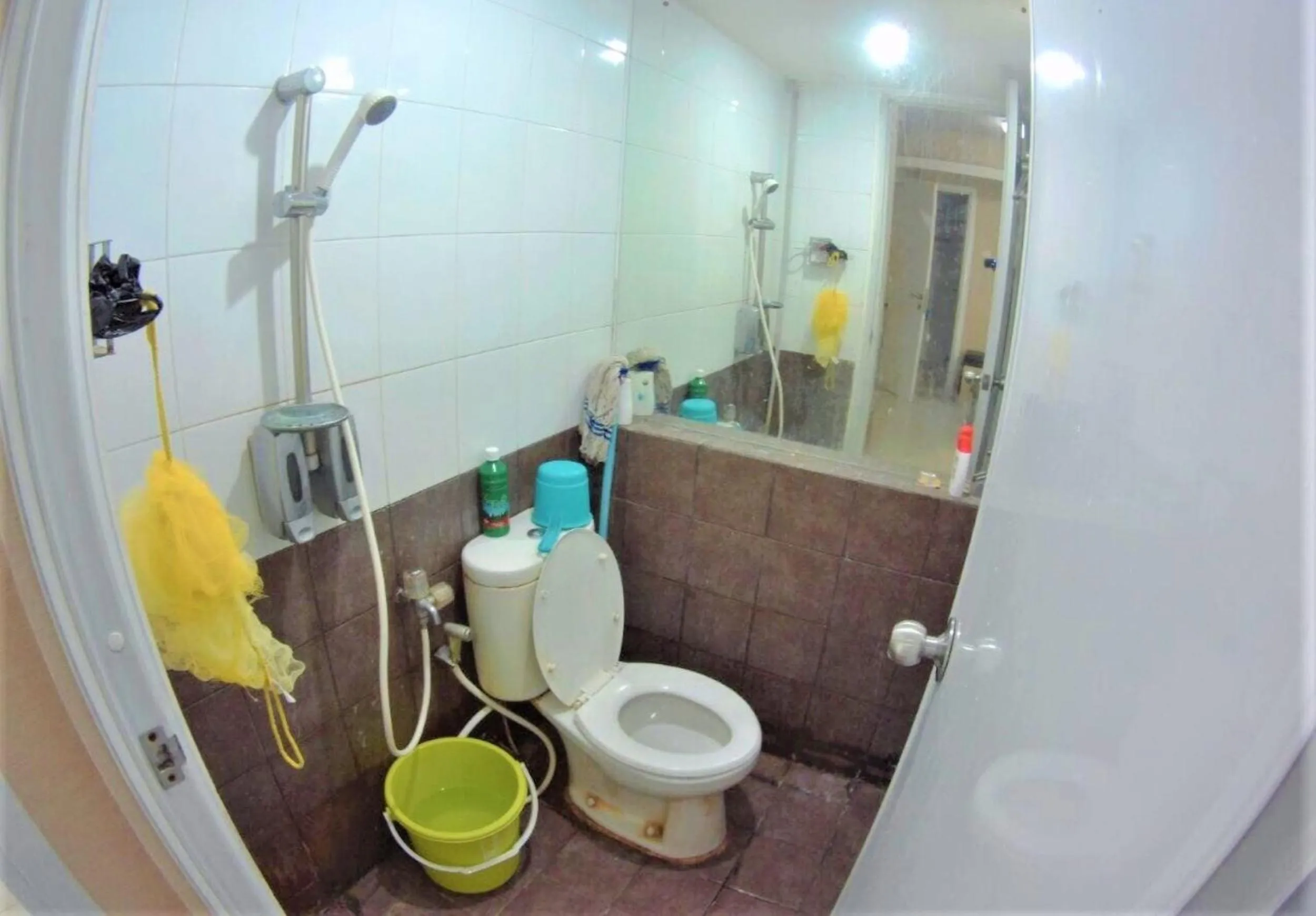 Bathroom in Green Pramuka Apartement By Vici