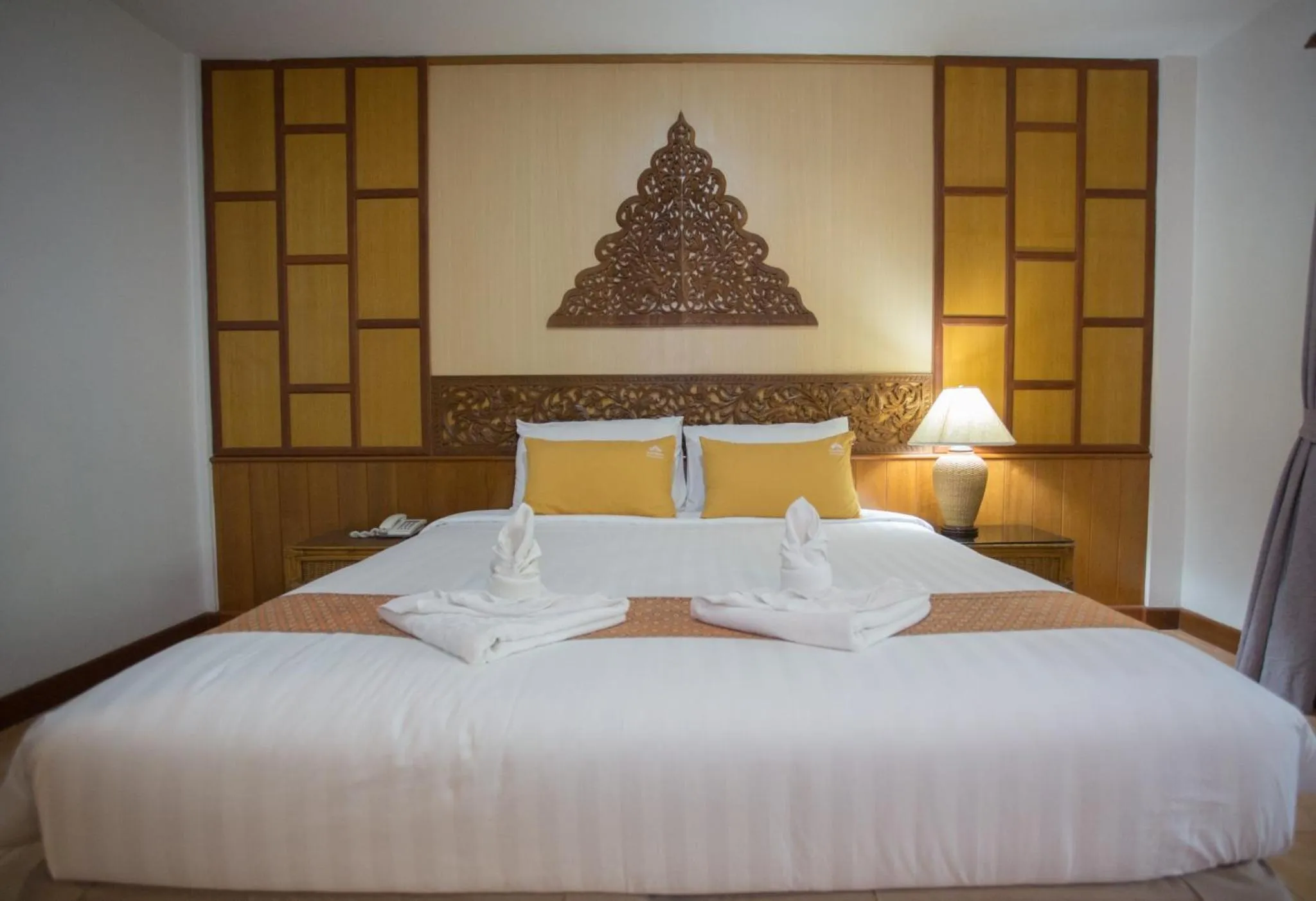 Bed in 100 Islands Resort & Spa