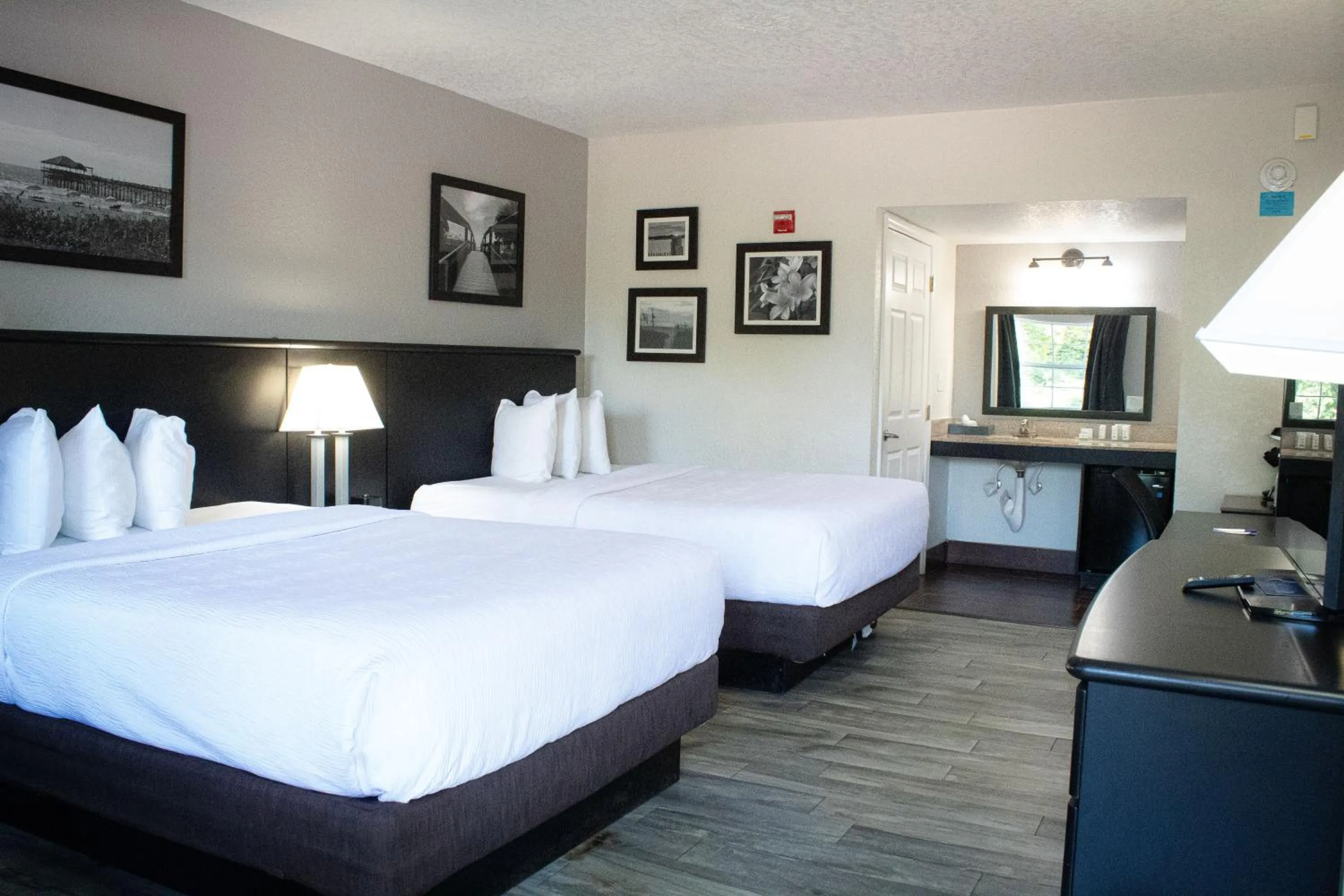 Bed in La Quinta Inn by Wyndham Cocoa Beach-Port Canaveral