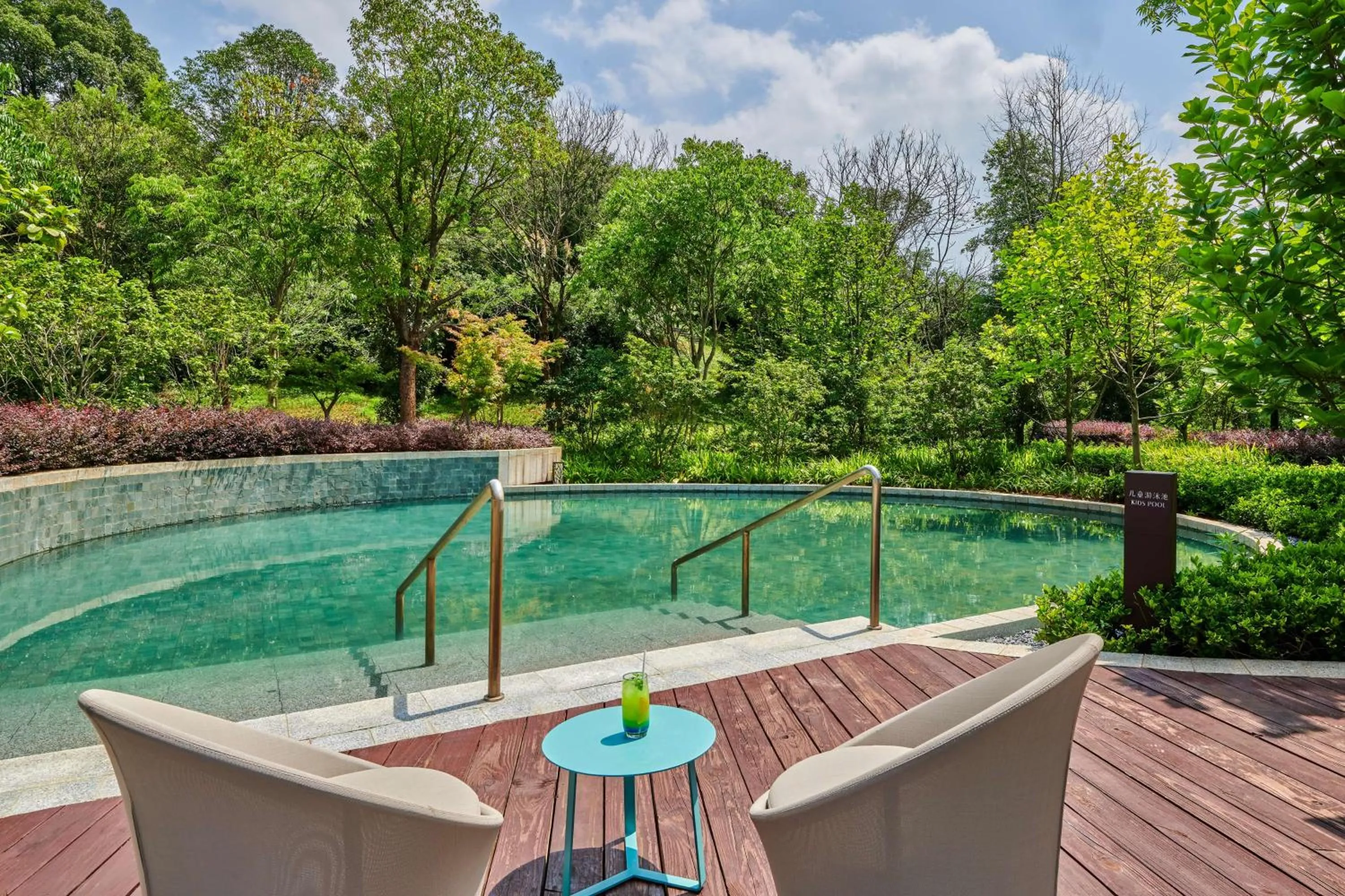 Pool view in Lushan West Sea Resort, Curio Collection by Hilton